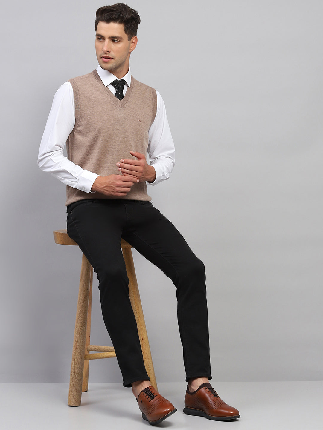 Men Beige Solid V Neck Sleeveless Sweater - Main Image