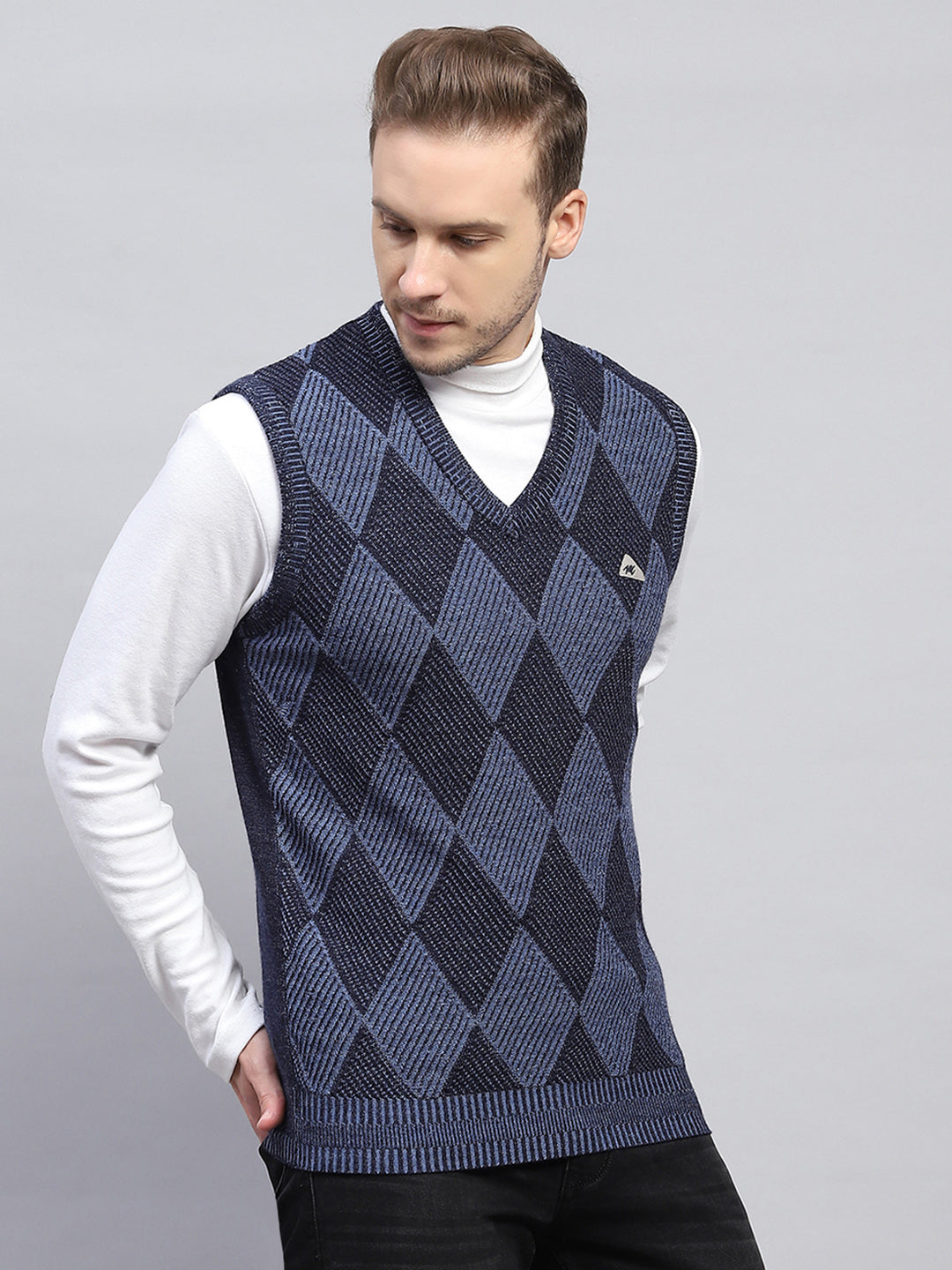 Men Navy Blue Self Design V Neck Sleeveless Sweater