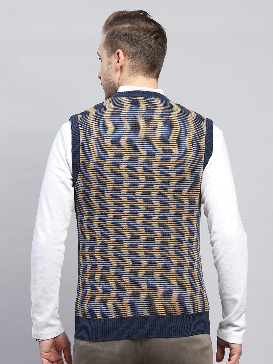 Men Navy Blue Self Design V Neck Sleeveless Sweater