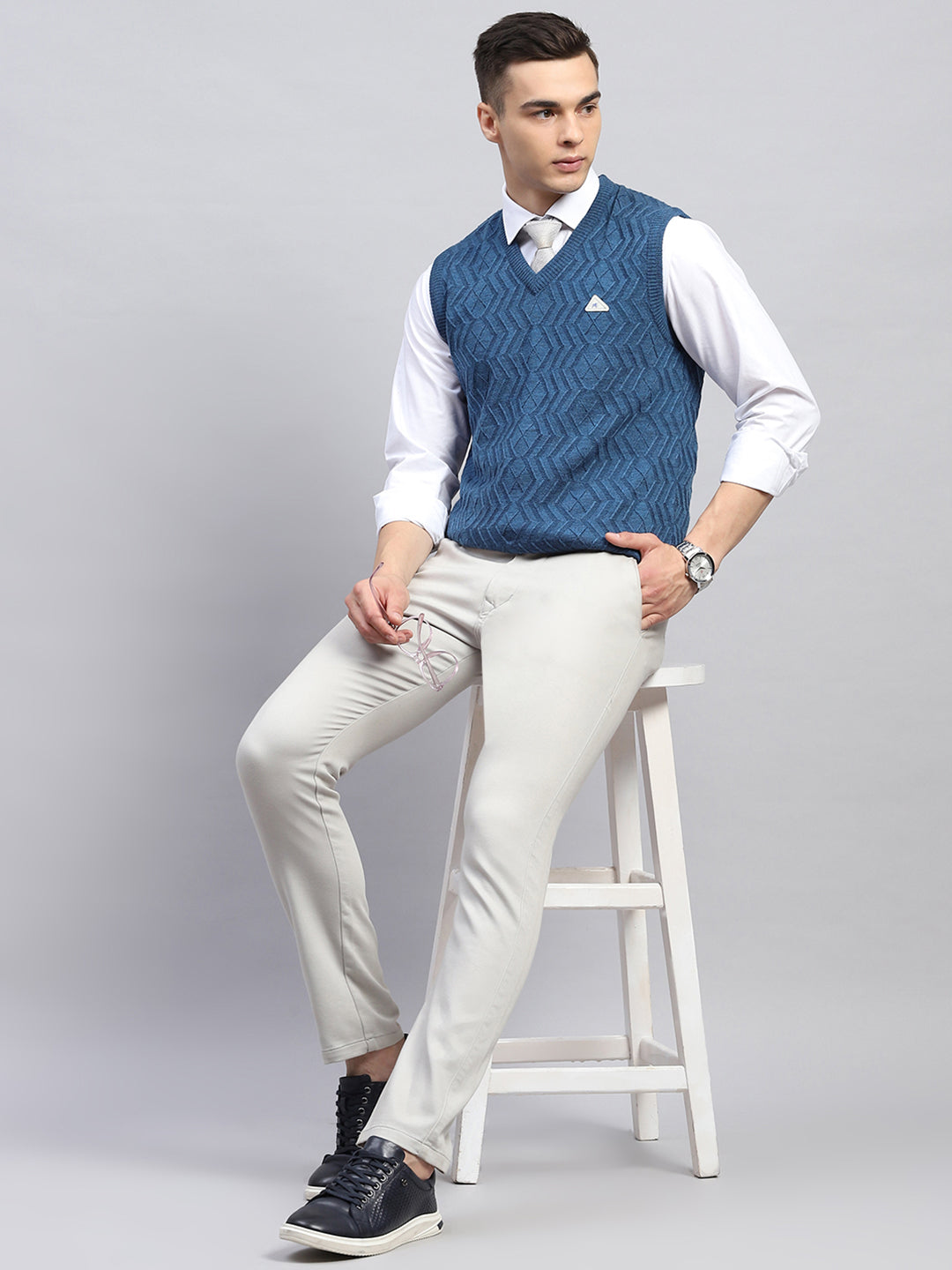 Men Blue Self Design V Neck Sleeveless Sweater