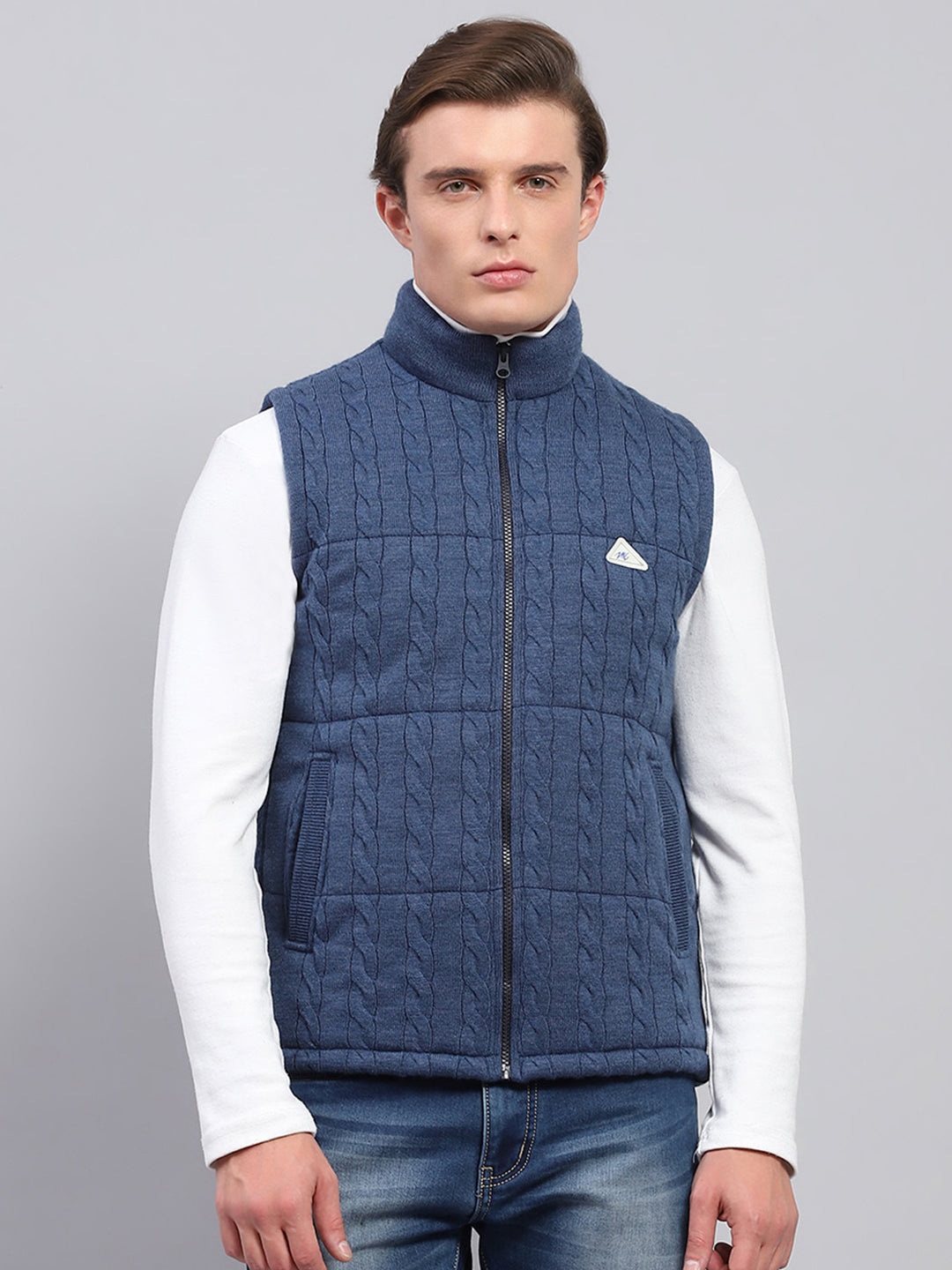 Buy Men Blue Self Design Mock Neck Sleeveless Jacket Online in
