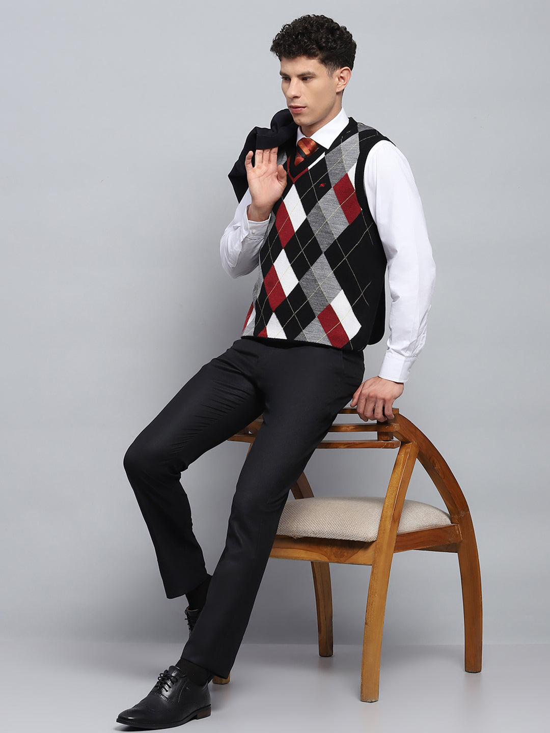 Men Black Self Design V Neck Sleeveless Sweater