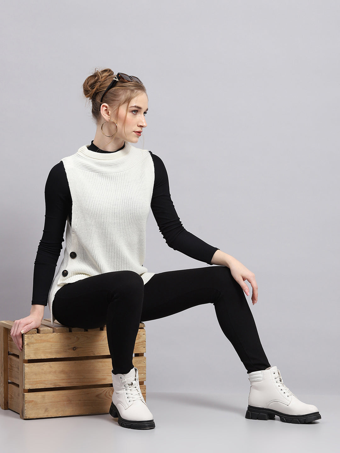 Women Off White Self Design Round Neck Sleeveless Winter Tops