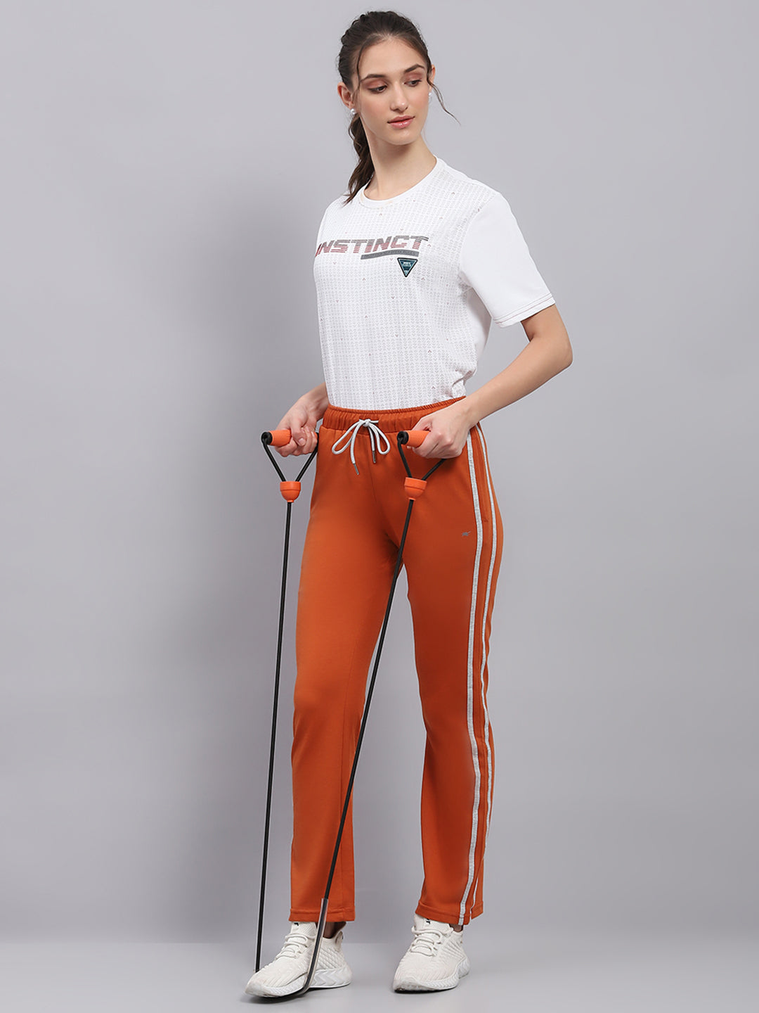 Women Orange Solid Regular Fit Lower