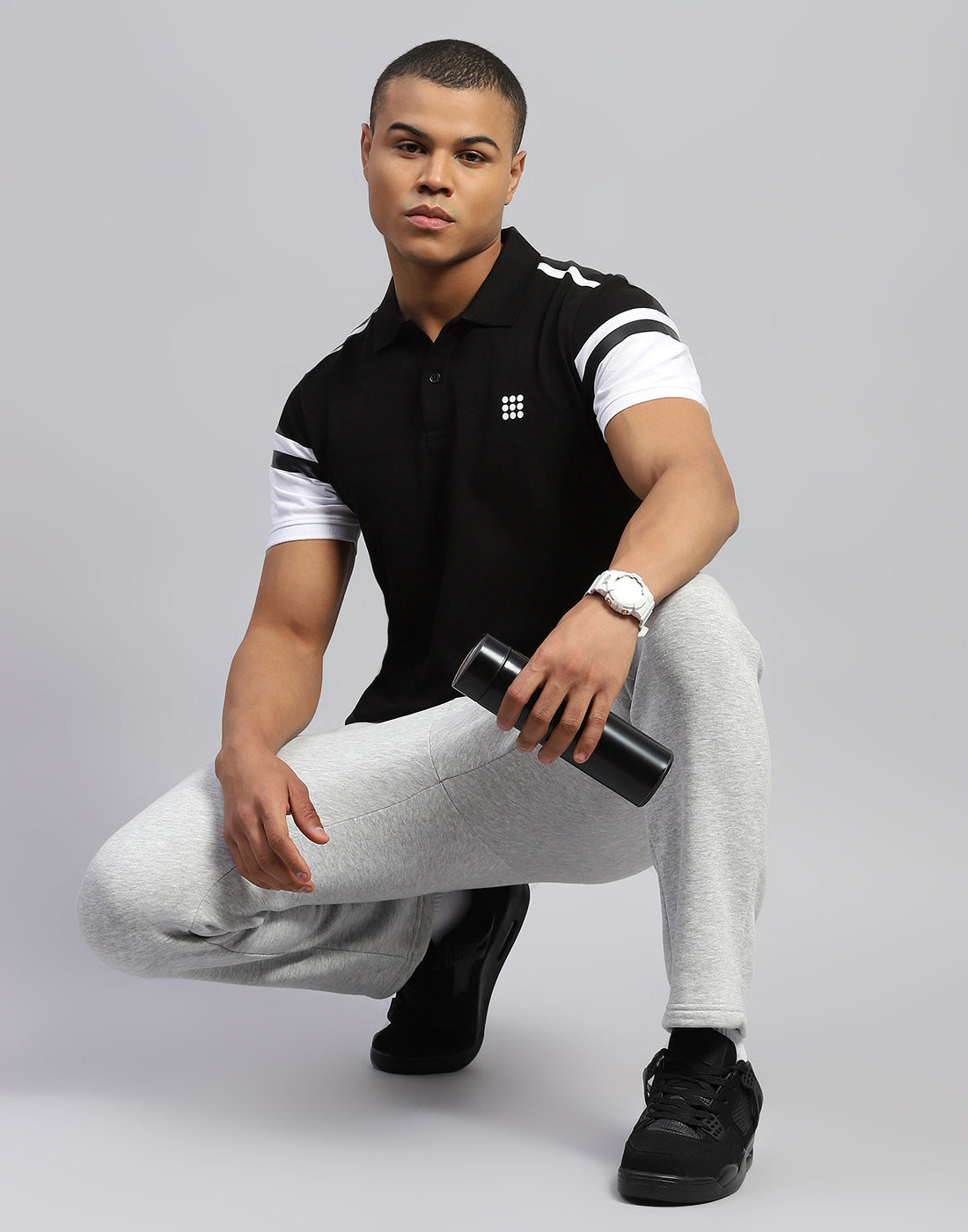 Rock.it Men Black Solid Polo Collar Half Sleeve T-Shirt