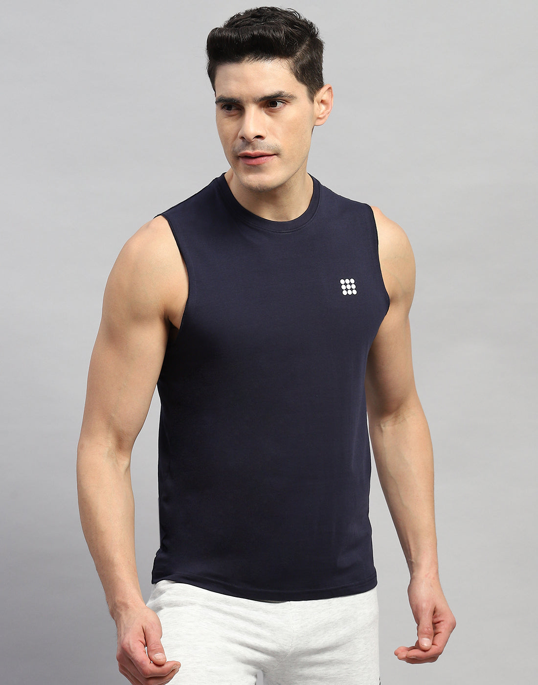Men Navy Blue Solid Round Neck Sleeveless T-Shirt