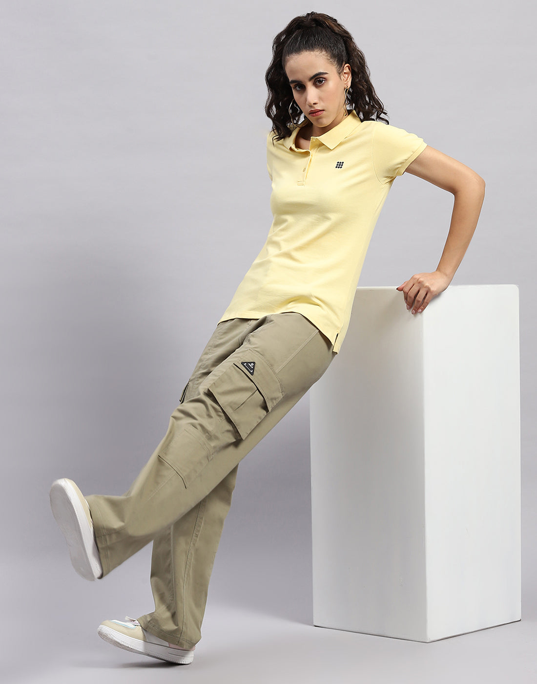 Women Yellow Solid Polo Collar Half Sleeve T Shirt
