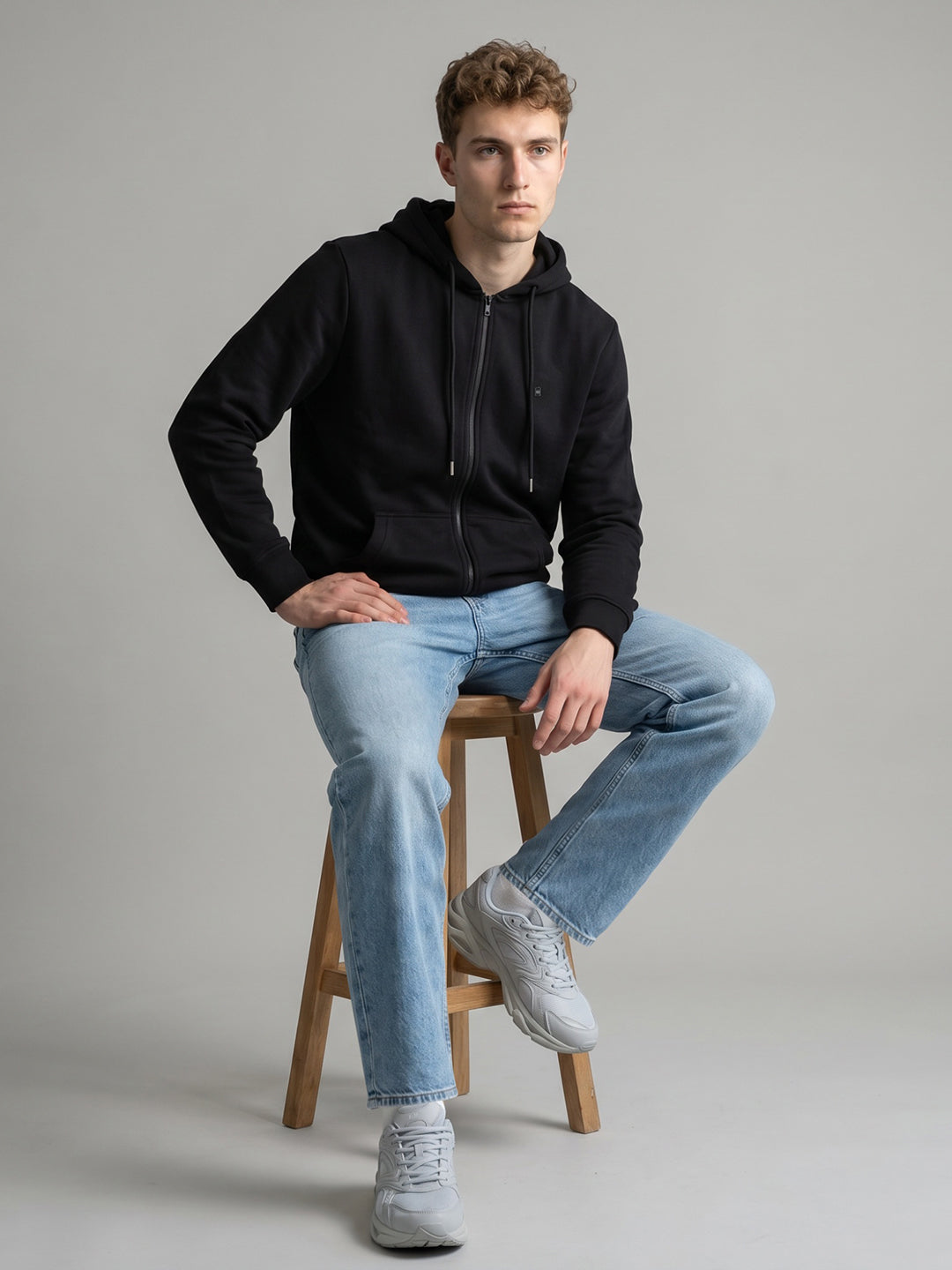 Men Black Solid Hooded Full Sleeve Sweatshirt