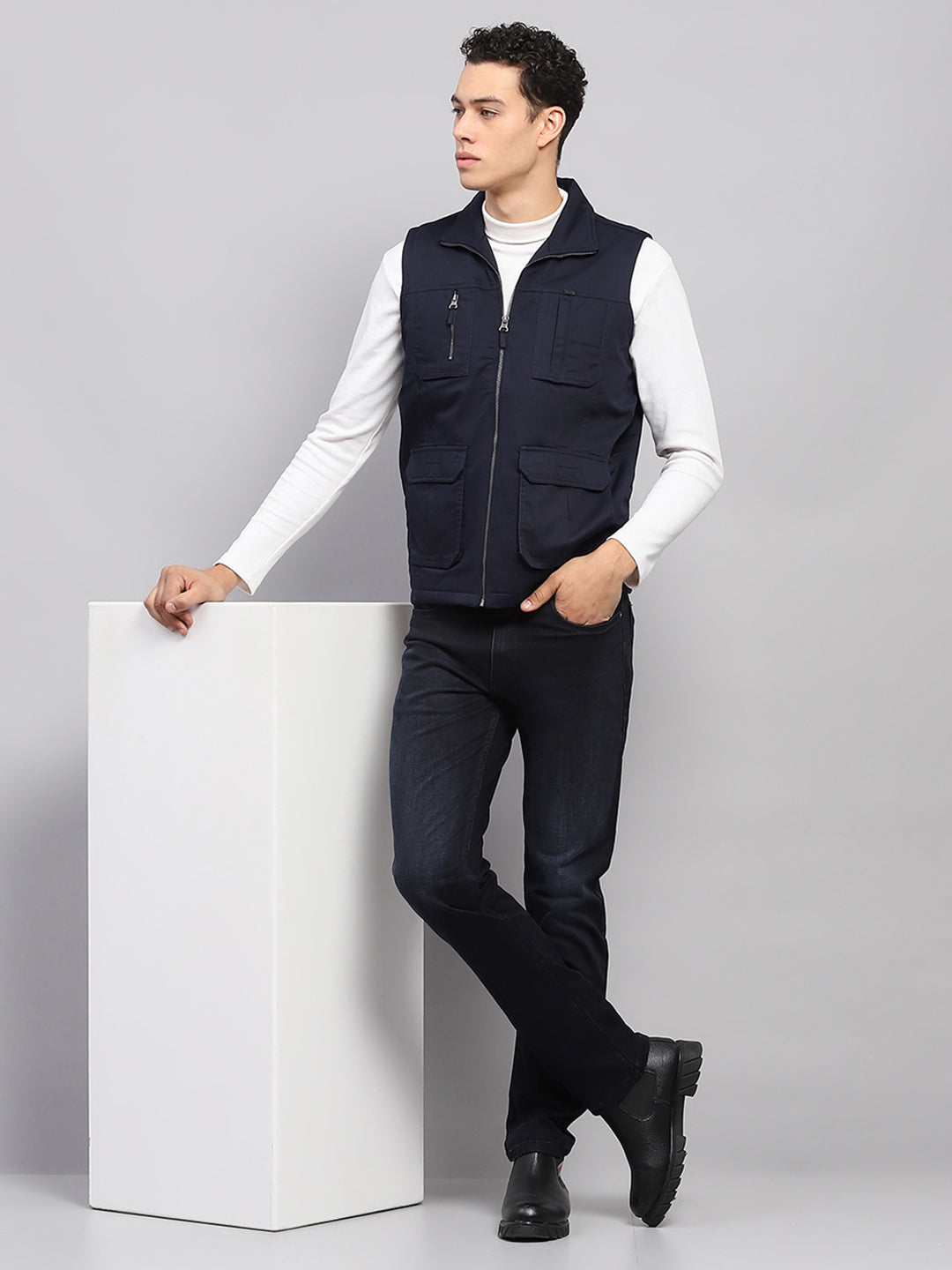 Buy Men Navy Blue Solid Mock Neck Sleeveless Jacket Online in