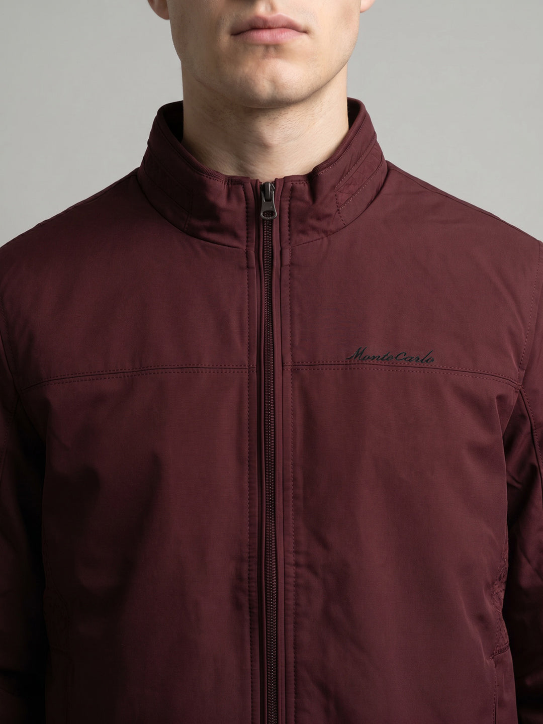 Men Maroon Solid Stand Collar Full Sleeve Bomber Jacket