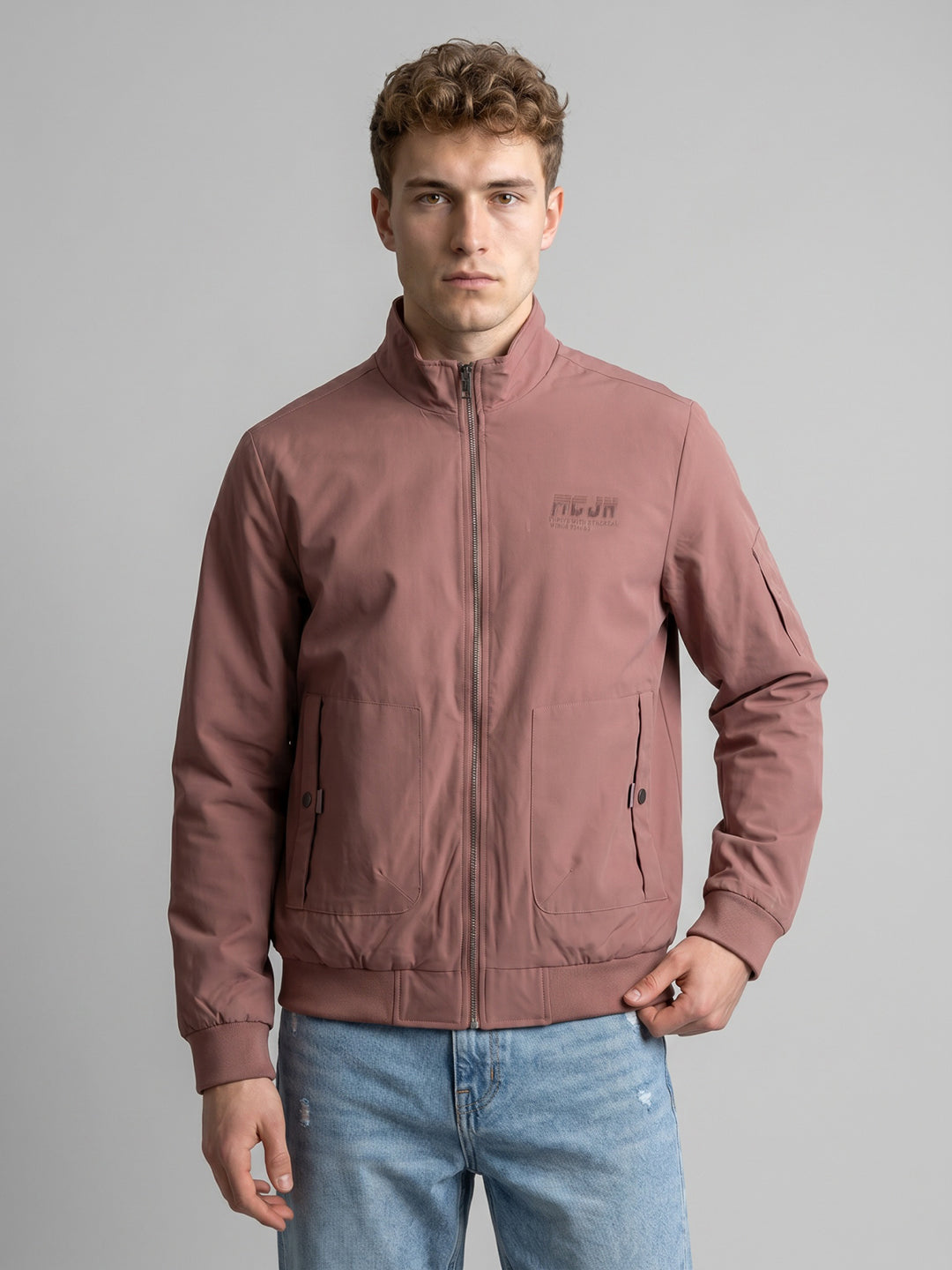 Men Peach Solid Stand Collar Full Sleeve Bomber Jacket