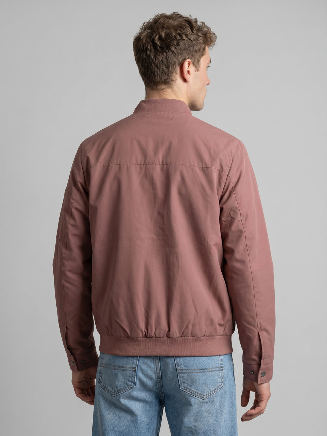 Men Peach Solid Stand Collar Full Sleeve Bomber Jacket