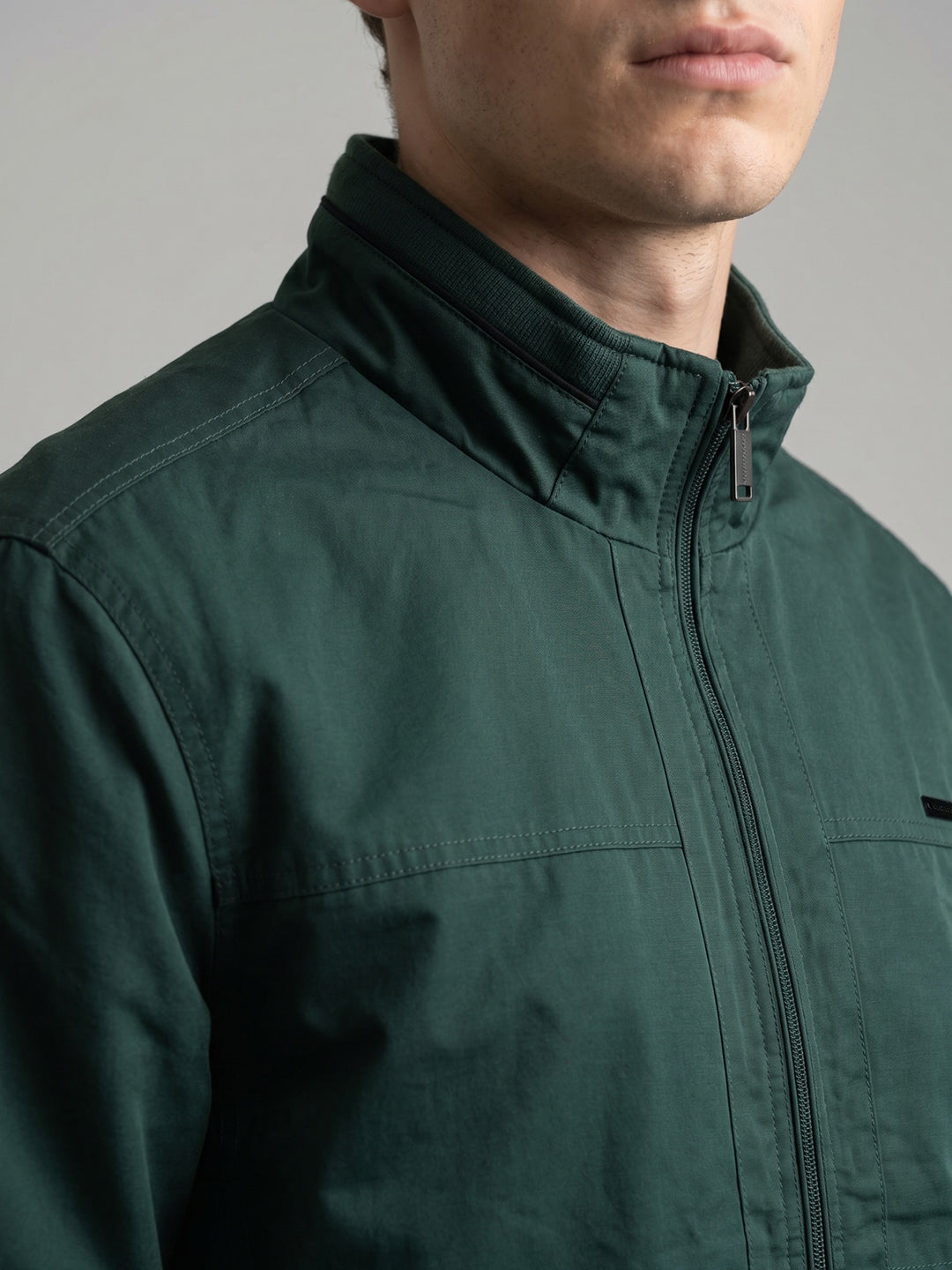 Men Green Solid Turtle Neck Full Sleeve Bomber Jacket