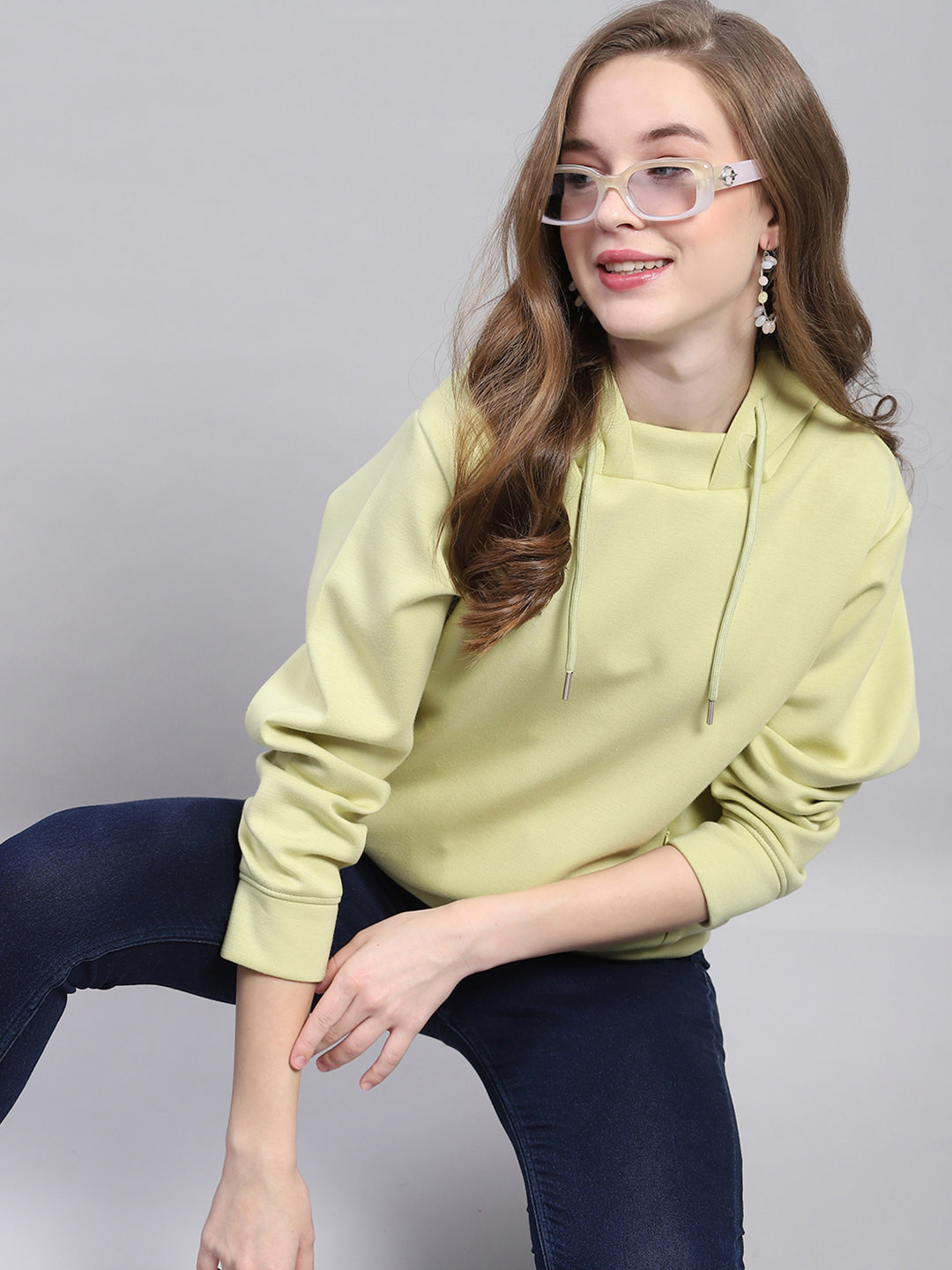 Women Green Solid Hooded Full Sleeve Sweatshirt