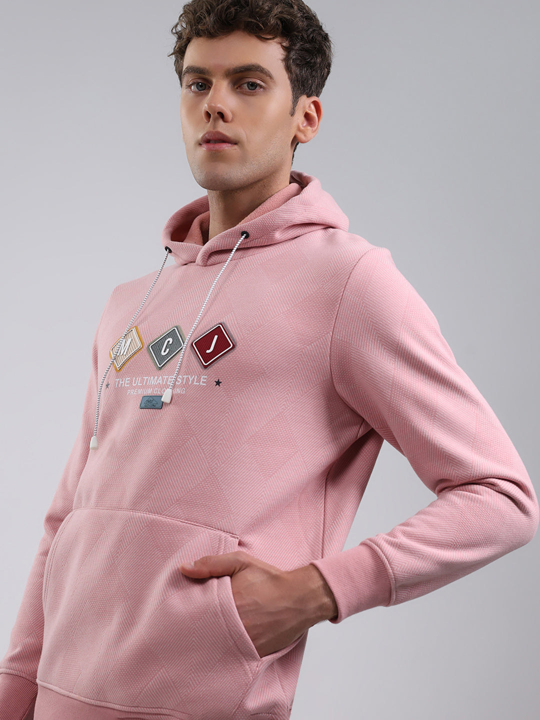 Men Peach Solid Hooded Full Sleeve Sweatshirt