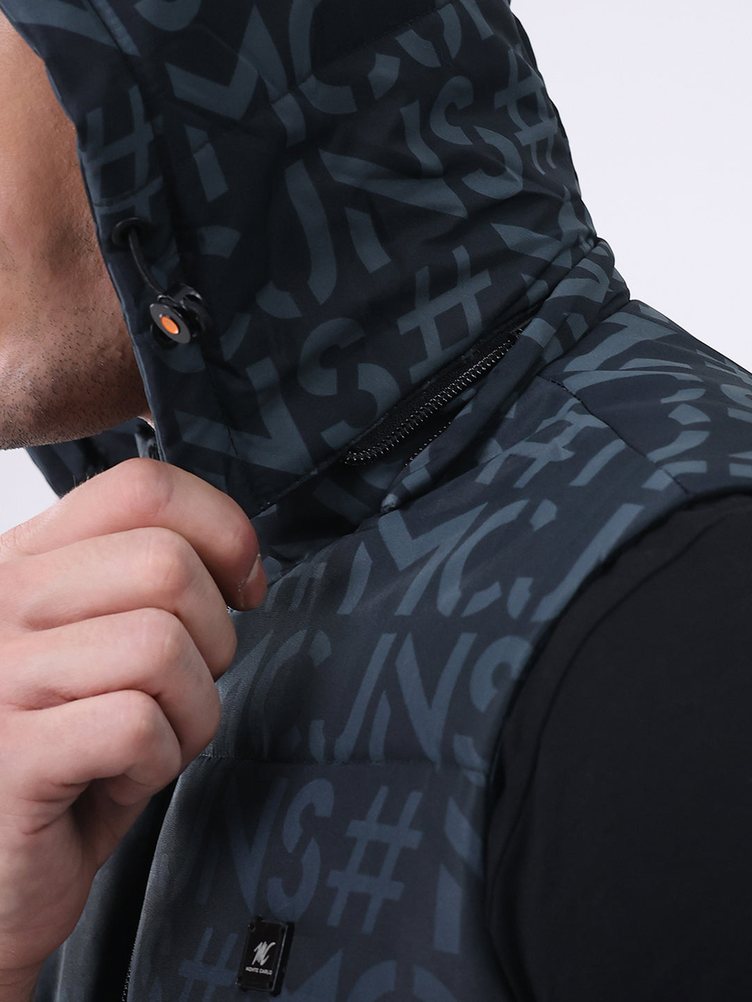 Men Black Self Design Hooded Sleeveless Jacket