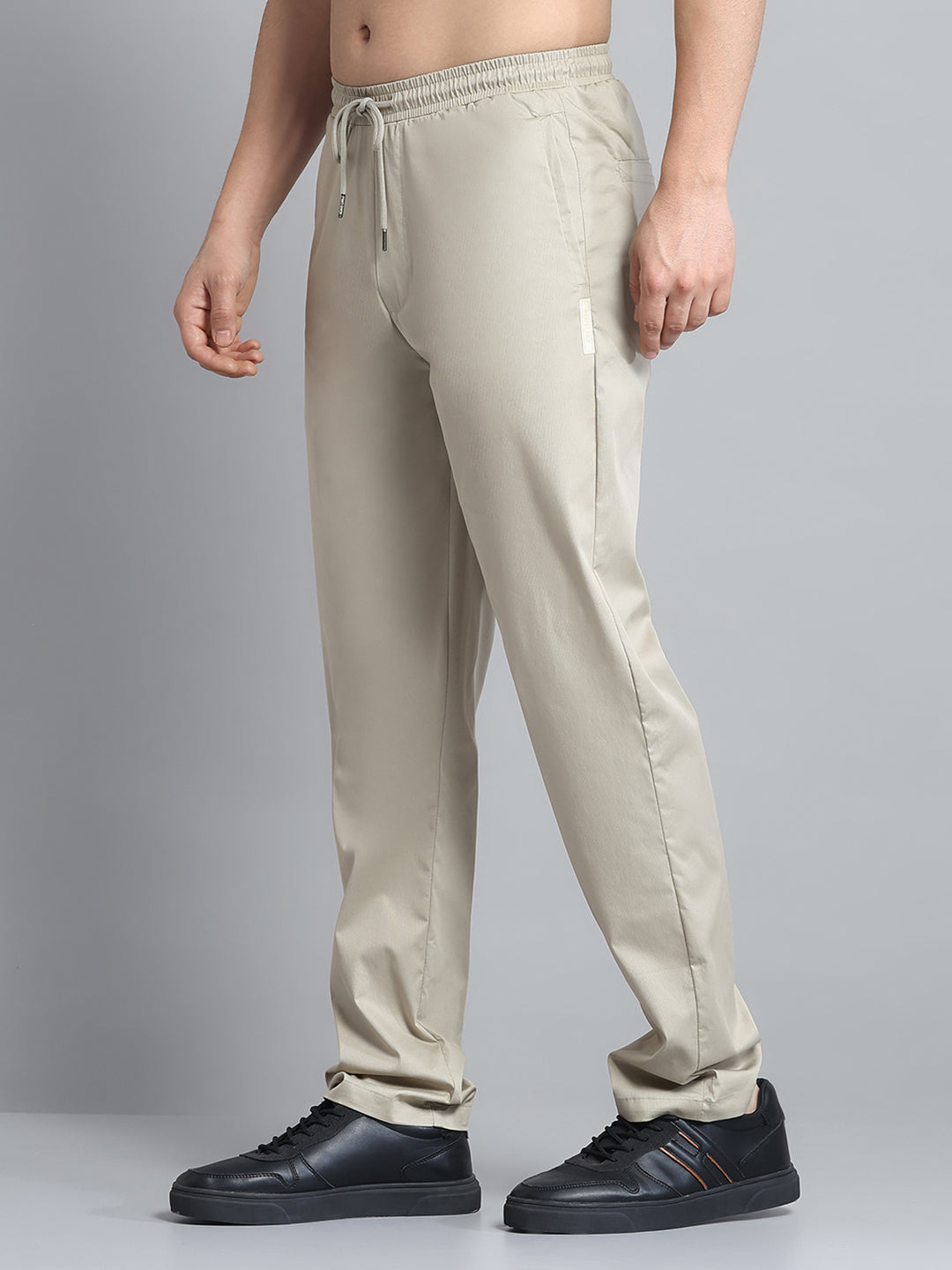 Men Beige Solid Regular Fit Lower