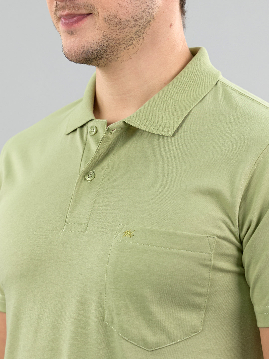 Men Green Solid Polo Collar Half Sleeve T-Shirt