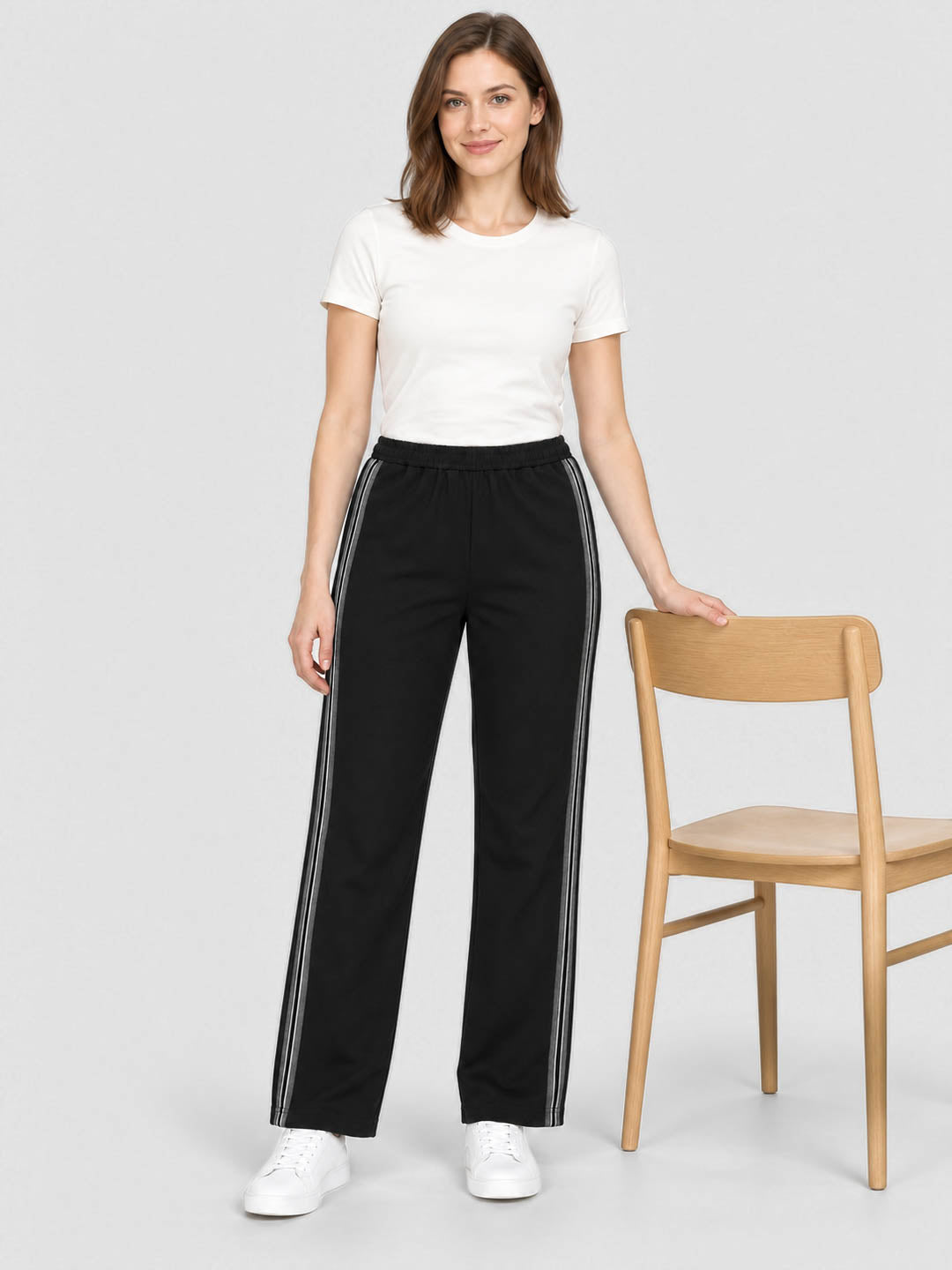 Women Black Solid Regular Fit Winter Lower