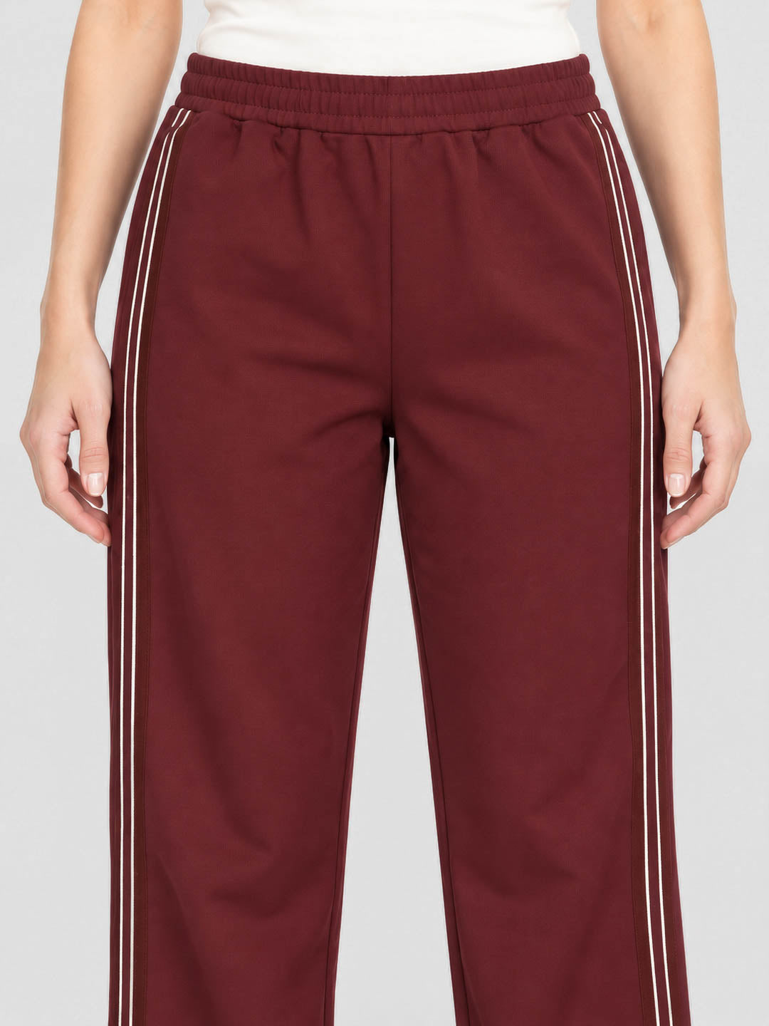 Women Burgundy Solid Regular Fit Winter Lower