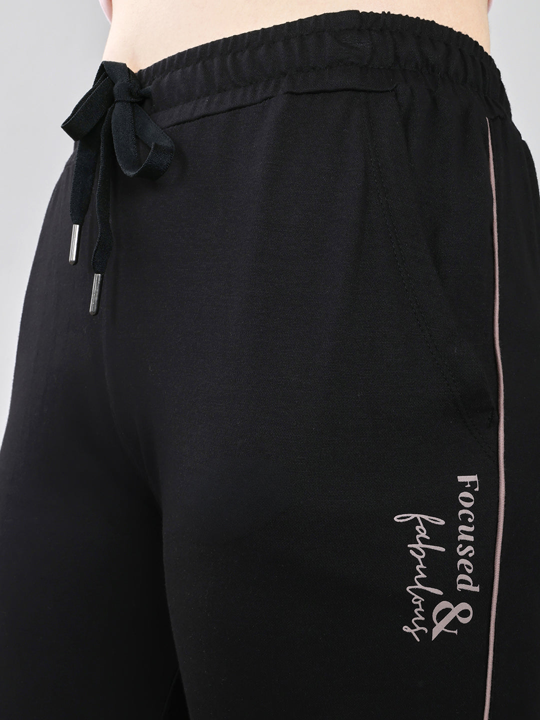 Women Black Solid Regular Fit Lower