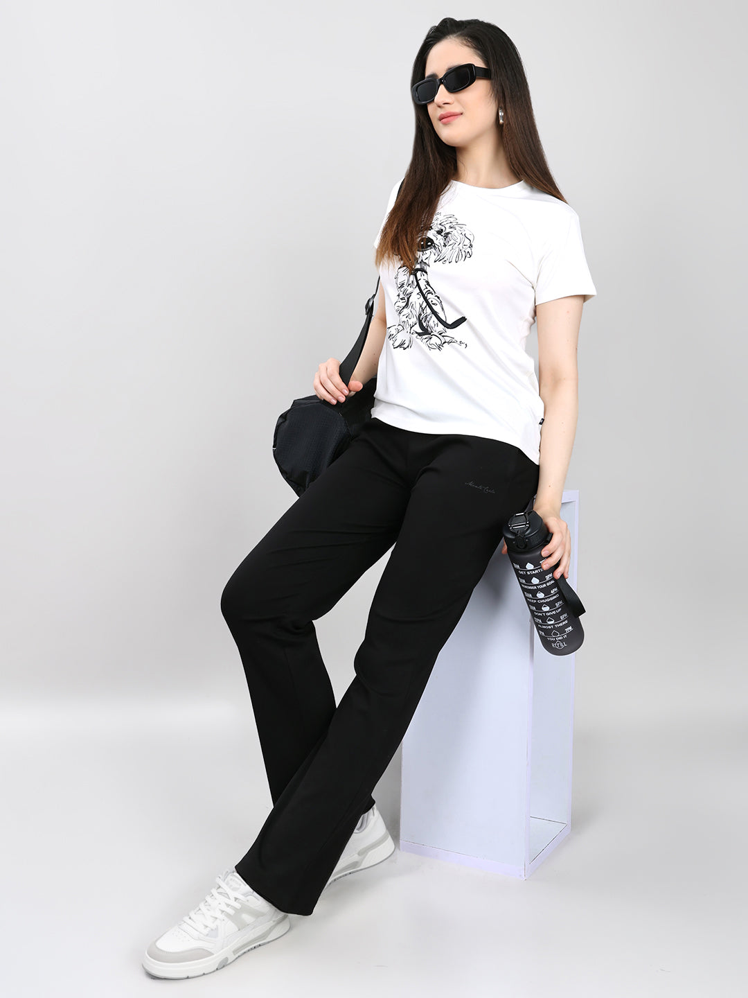 Women Black Solid Regular Fit Lower