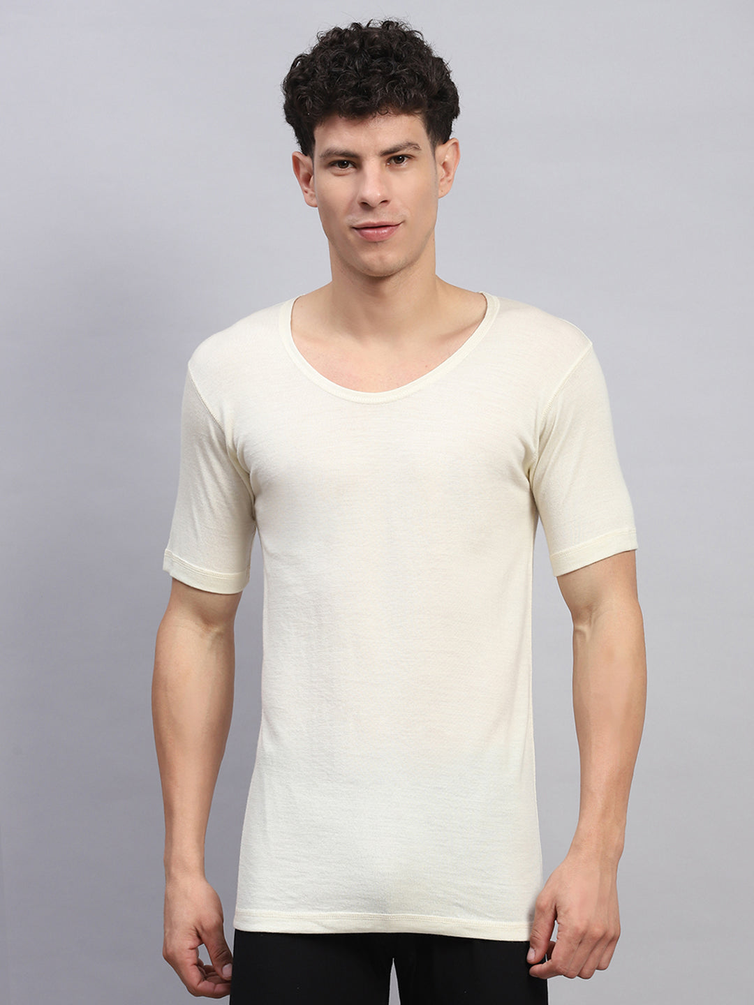 Men Cream Solid Round Neck Half Sleeve Thermal Vest