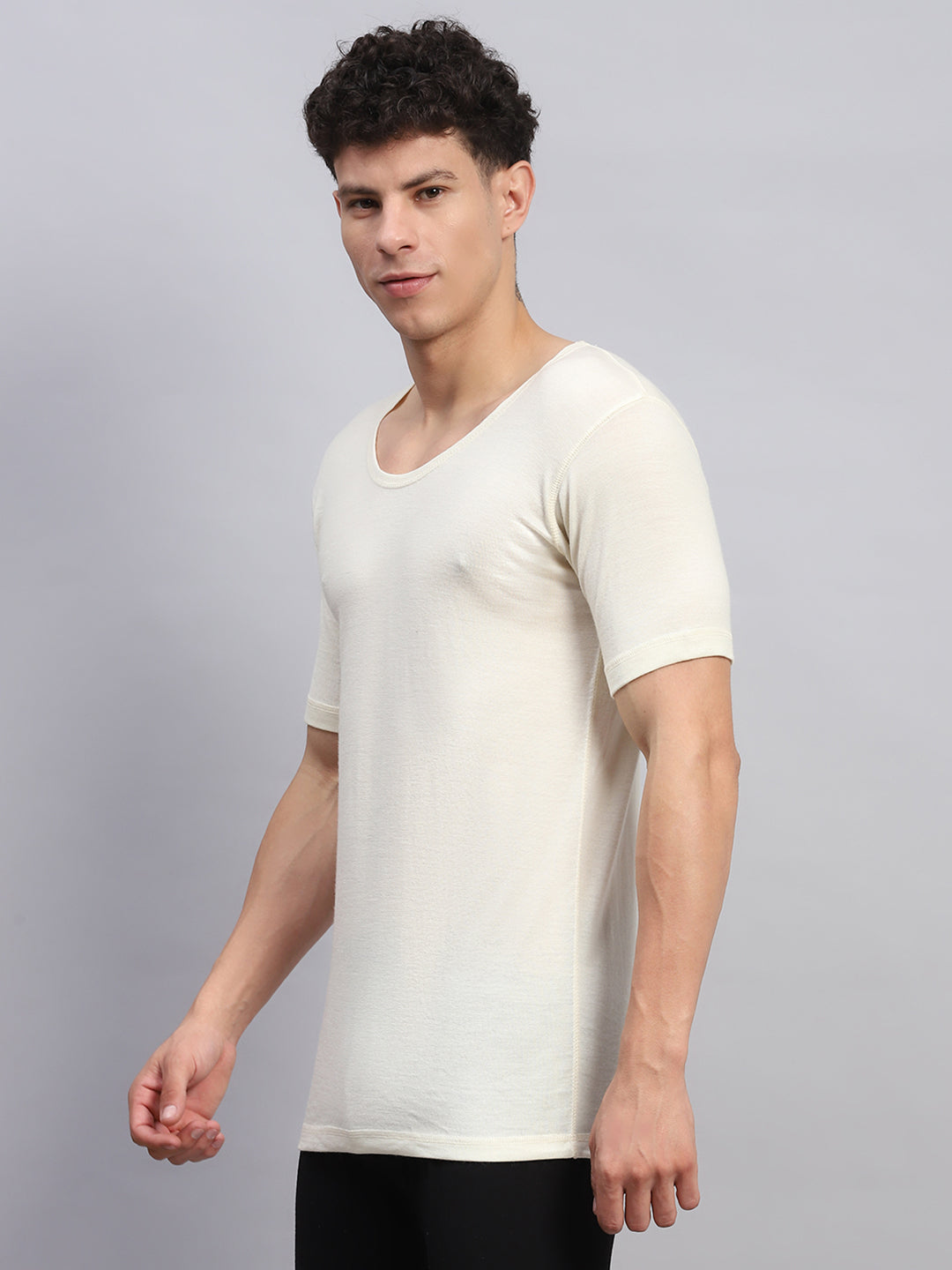 Men Cream Solid Round Neck Half Sleeve Thermal Vest