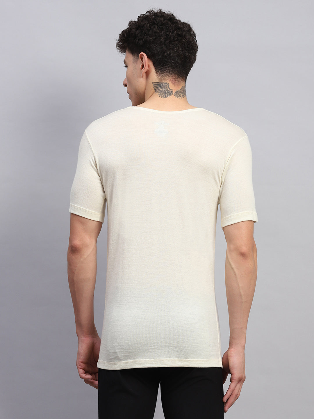 Men Cream Solid Round Neck Half Sleeve Thermal Vest