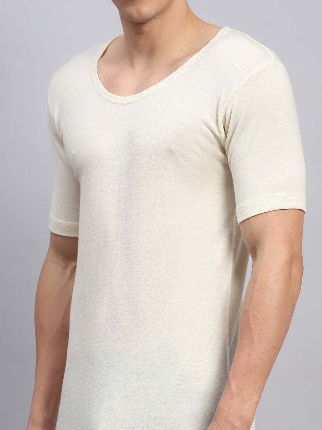 Men Cream Solid Round Neck Half Sleeve Thermal Vest