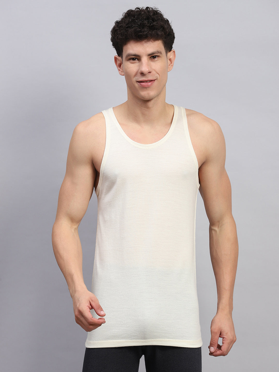 Men Cream Solid Round Neck Sleeveless Thermal Vest