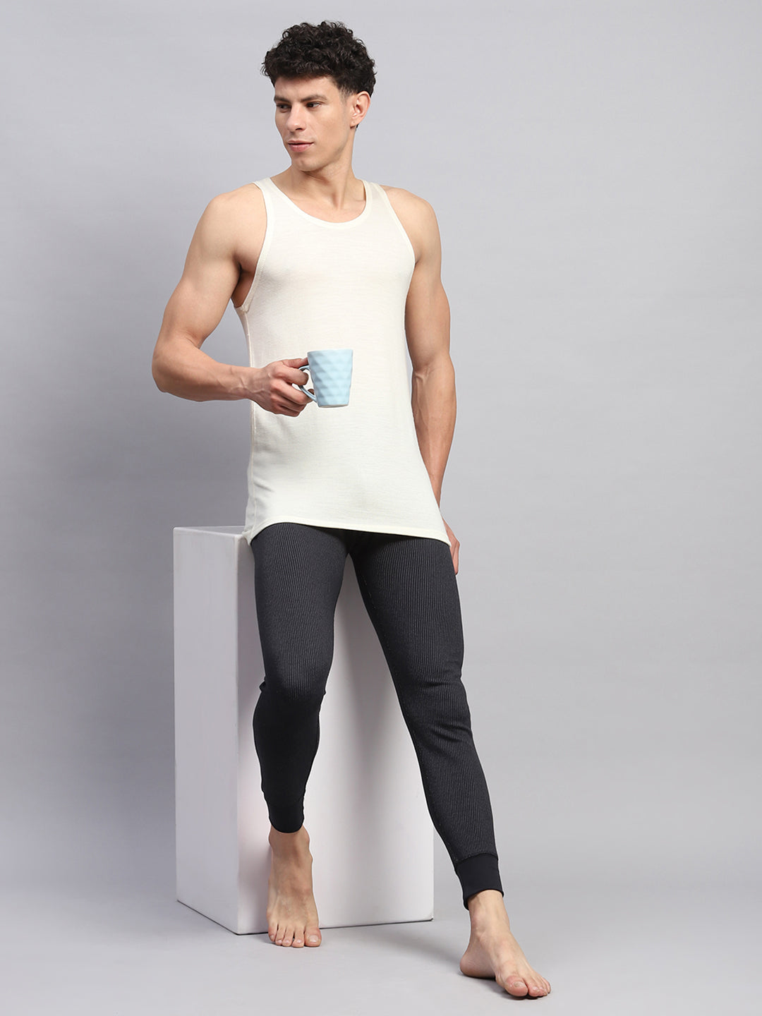 Men Cream Solid Round Neck Sleeveless Thermal Vest