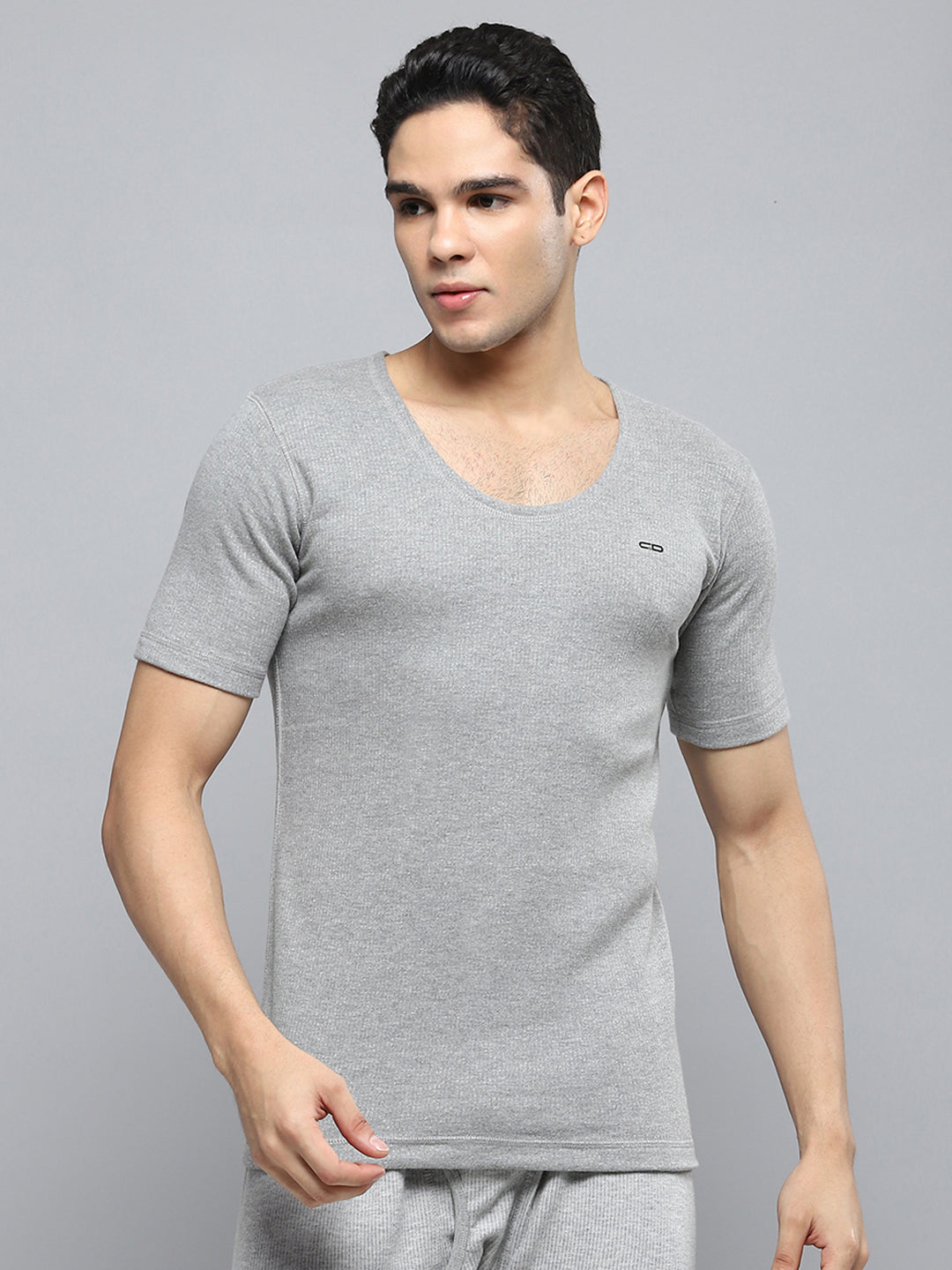 Buy Men Grey Solid Round Neck Half Sleeve Thermal Vest Online in
