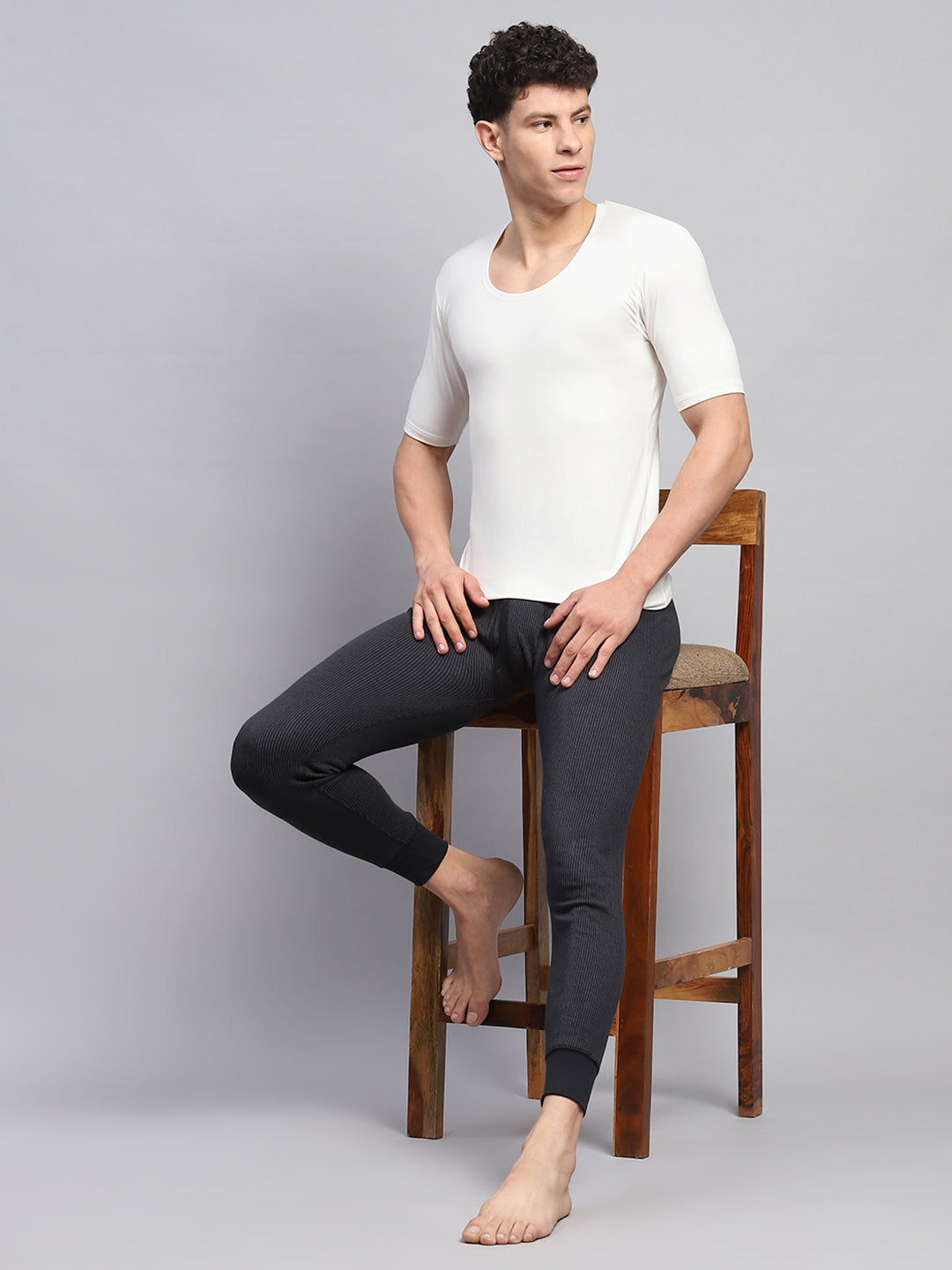 Men White Solid Round Neck Half Sleeve Thermal Vest