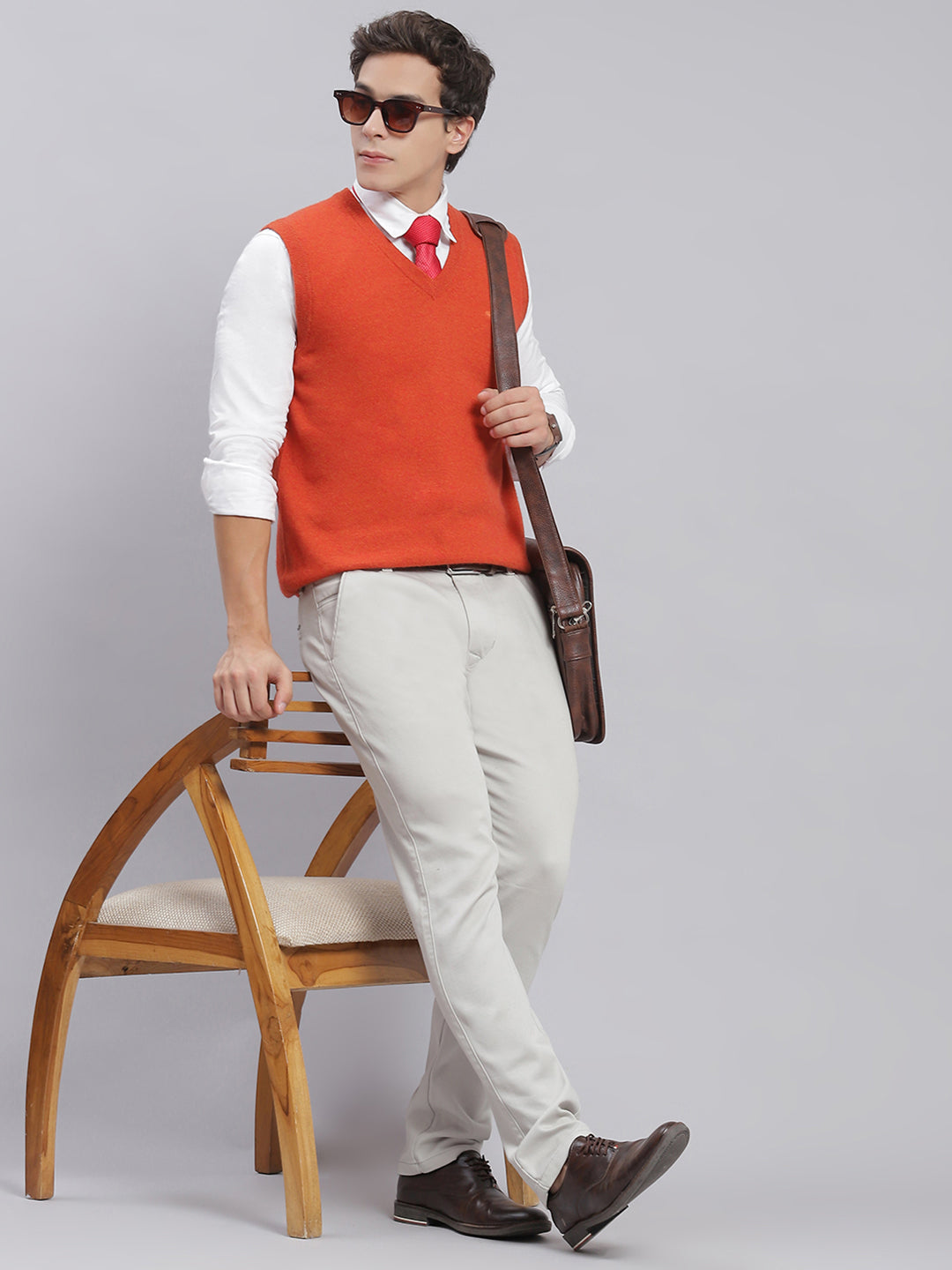 Men Orange Solid V Neck Sleeveless Sweaters/Pullovers