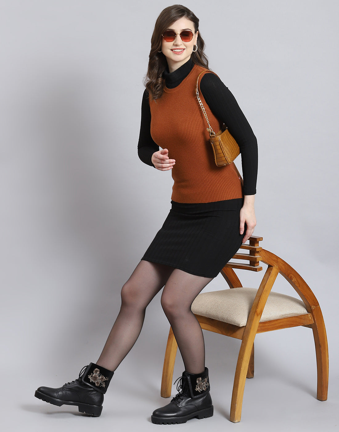 Women Rust Solid Round Neck Sleeveless Sweater