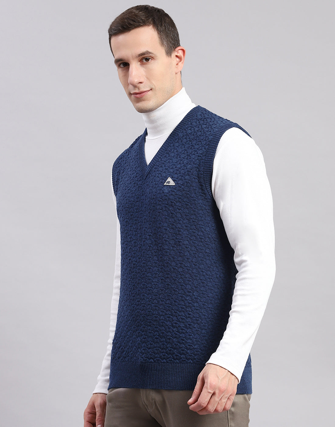 Men Blue Self Design V Neck Sleeveless Sweaters/Pullovers