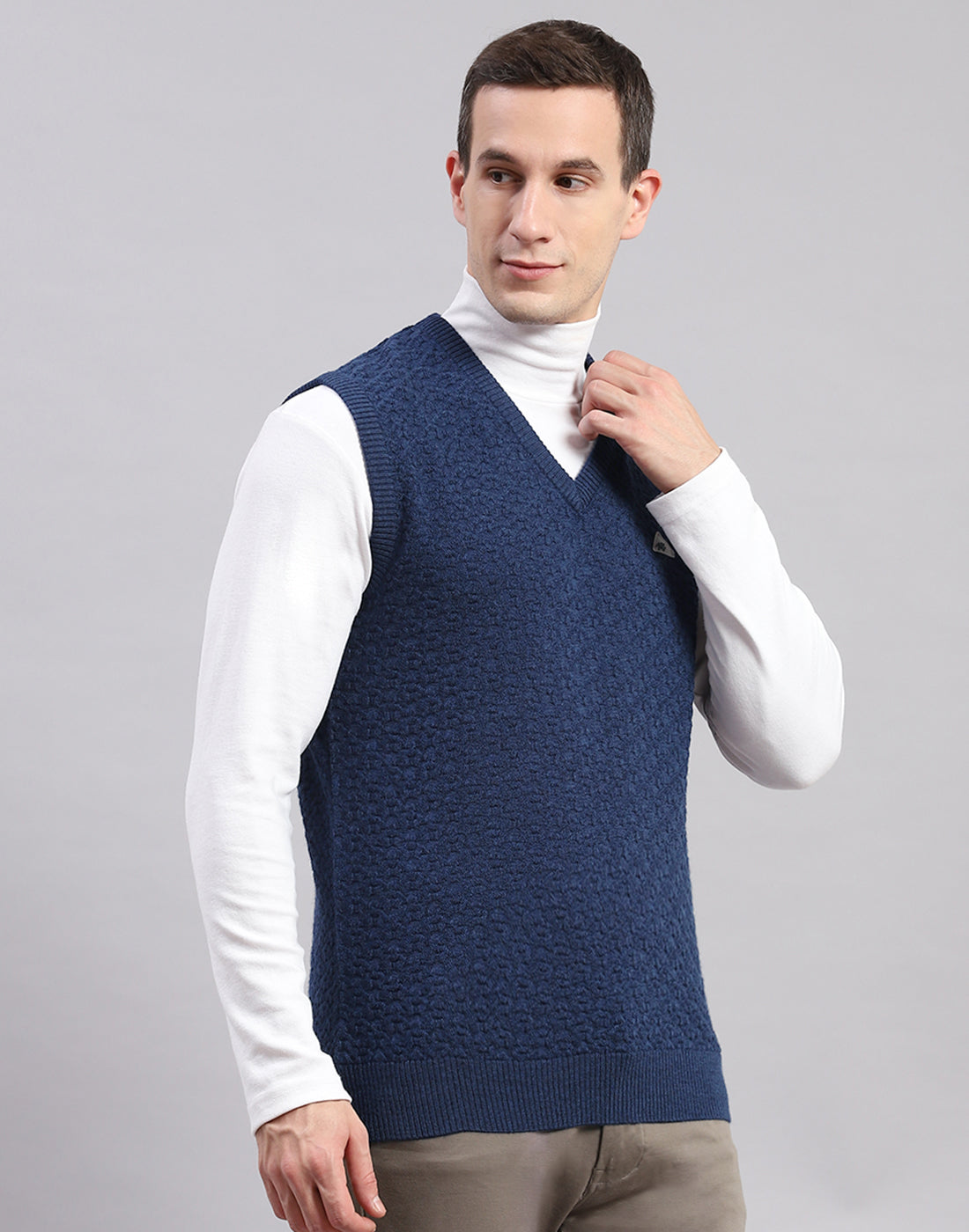 Men Blue Self Design V Neck Sleeveless Sweaters/Pullovers