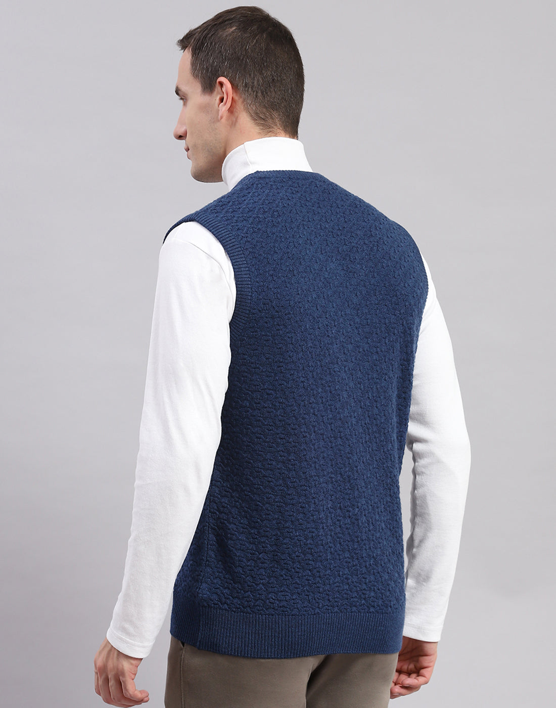 Men Blue Self Design V Neck Sleeveless Sweaters/Pullovers
