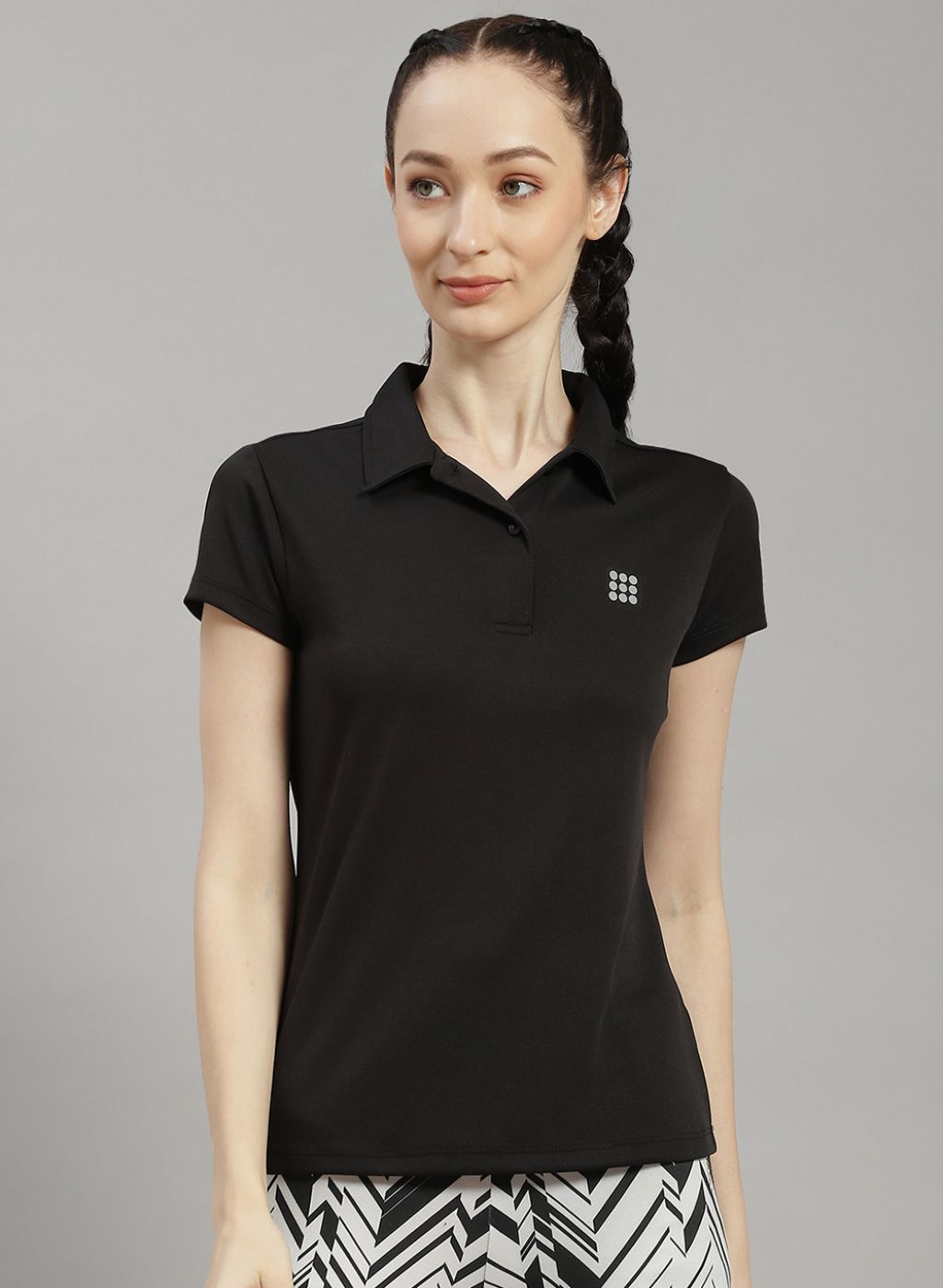 Buy Women Black Solid T-Shirt Online in India