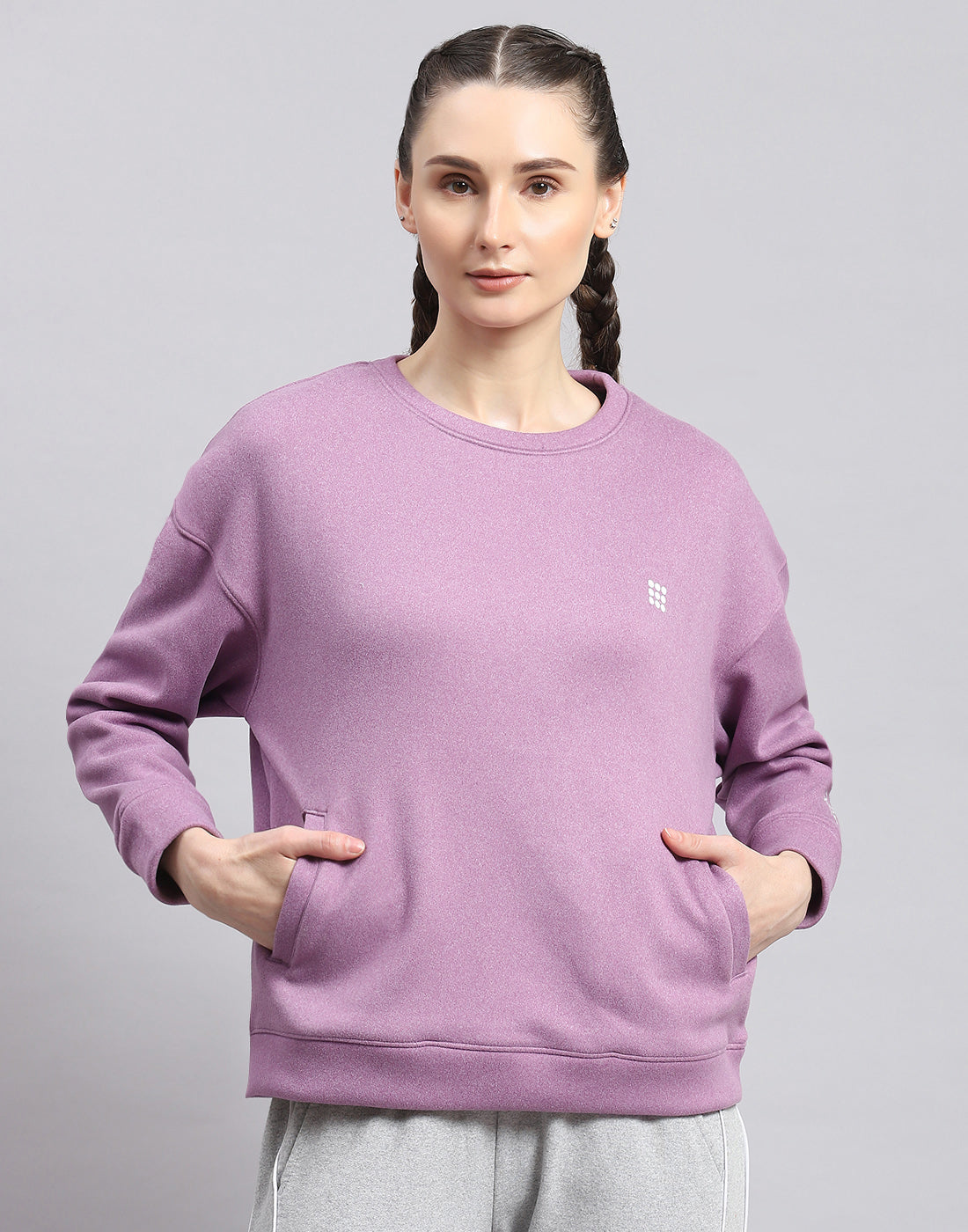 Women Purple Solid Round Neck Full Sleeve Sweatshirt