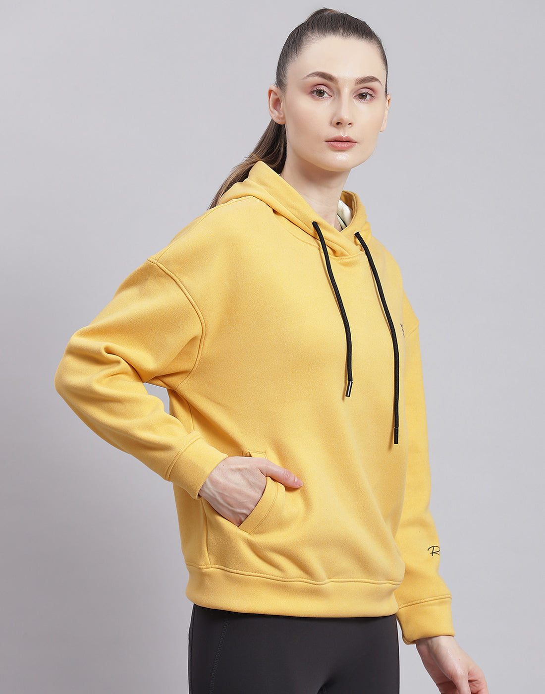 Women Yellow Solid Hooded Full Sleeve Sweatshirt