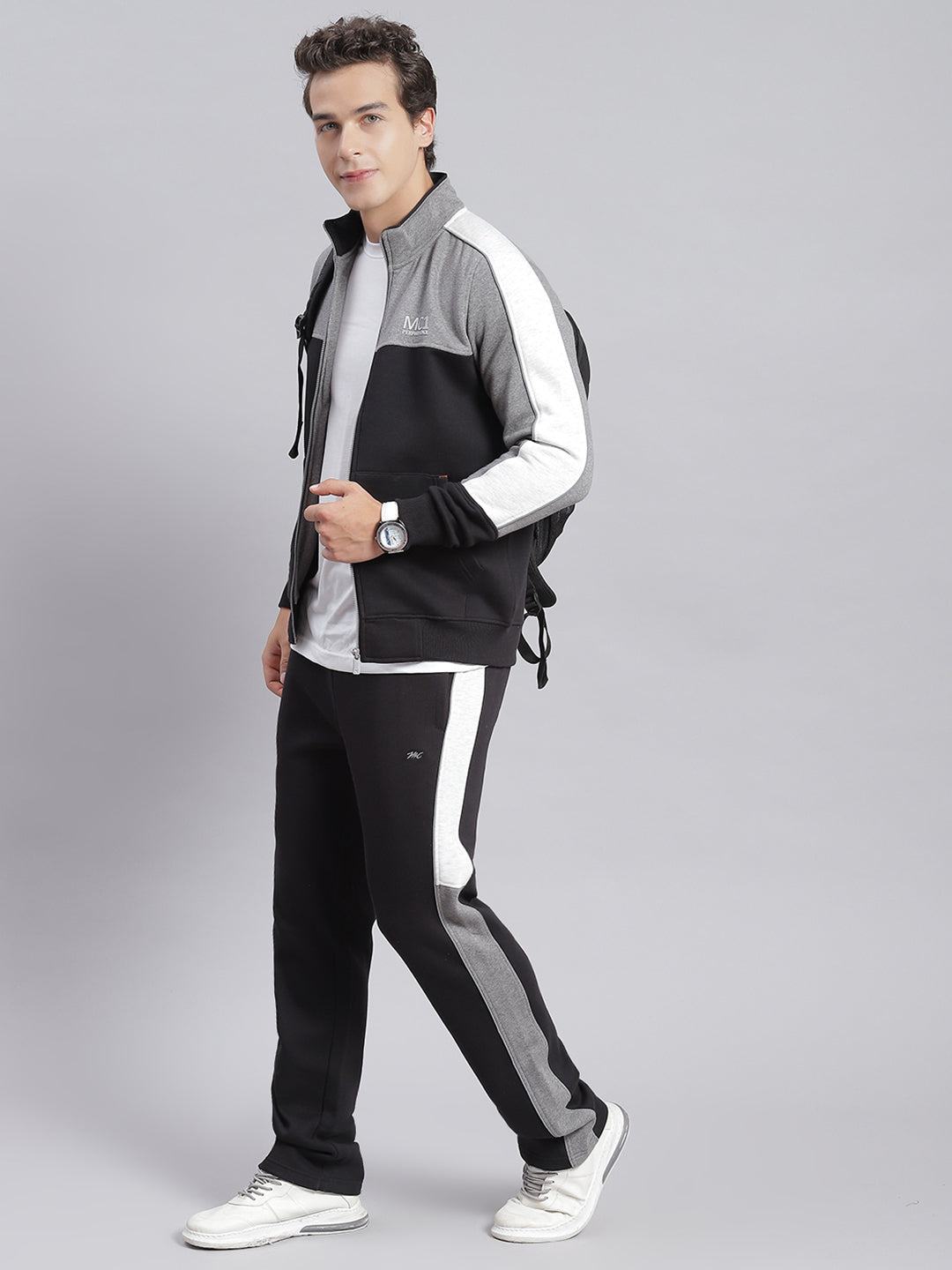 Men Black Solid Stand Collar Full Sleeve Tracksuits