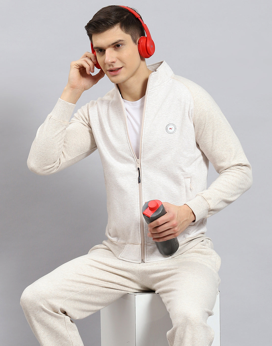 Men Off White Solid Stand Collar Full Sleeve Tracksuit