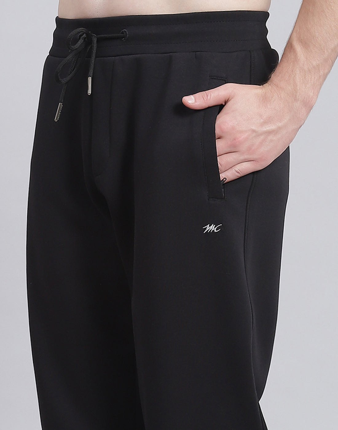 Men Black Solid Hooded Full Sleeve Tracksuit