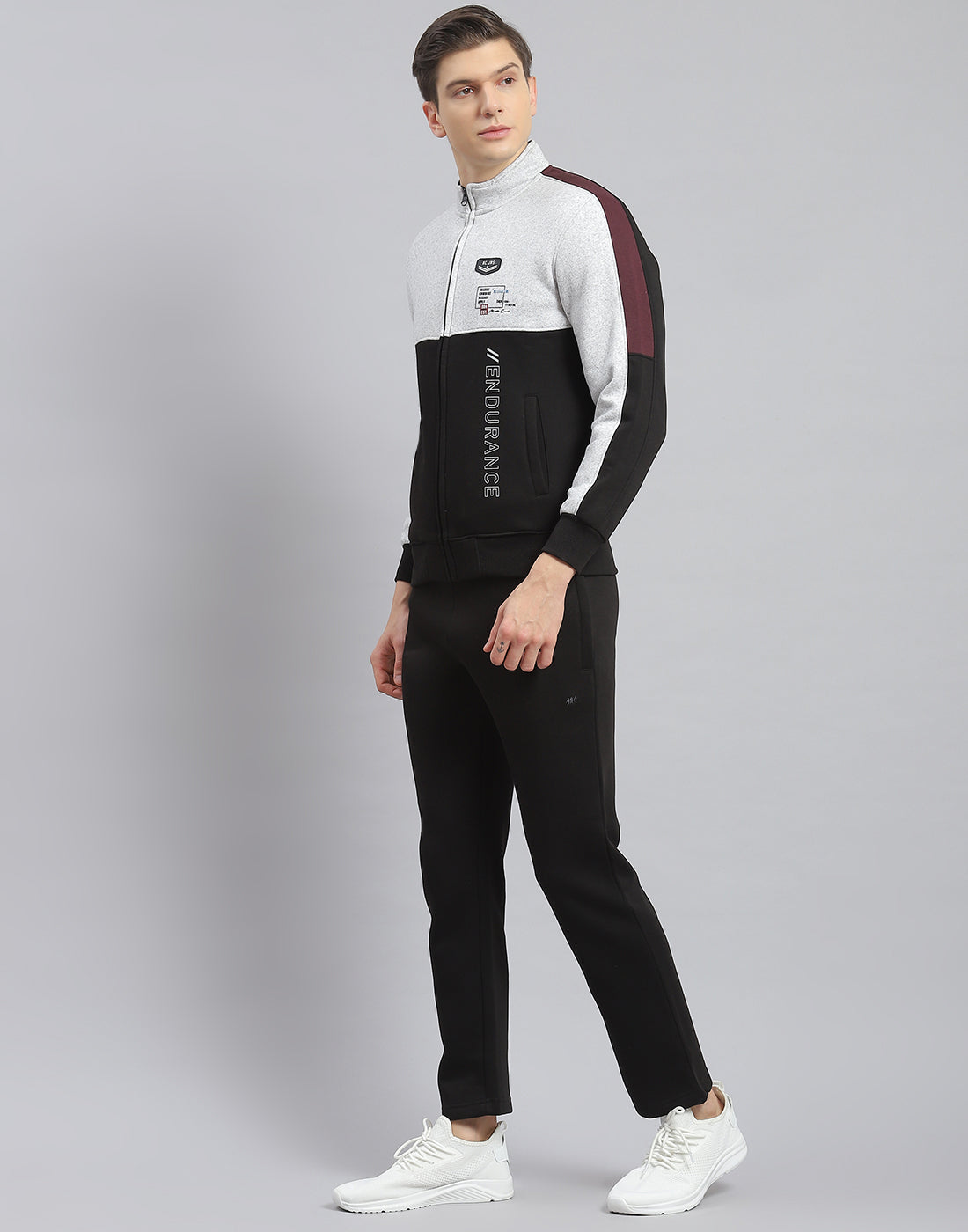 Men Black Solid Stand Collar Full Sleeve Tracksuit