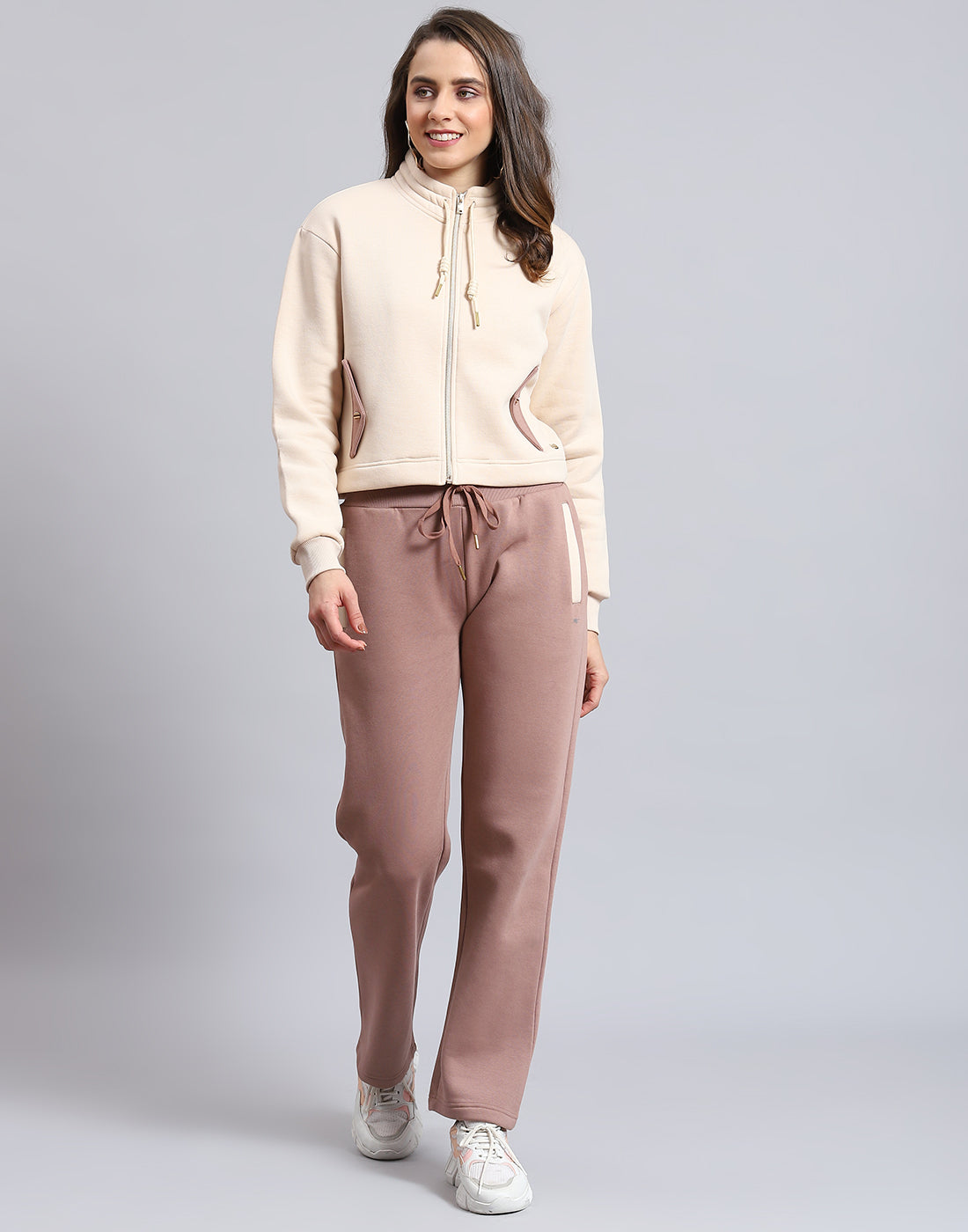 Women Beige Solid Stand Collar Full Sleeve Tracksuit