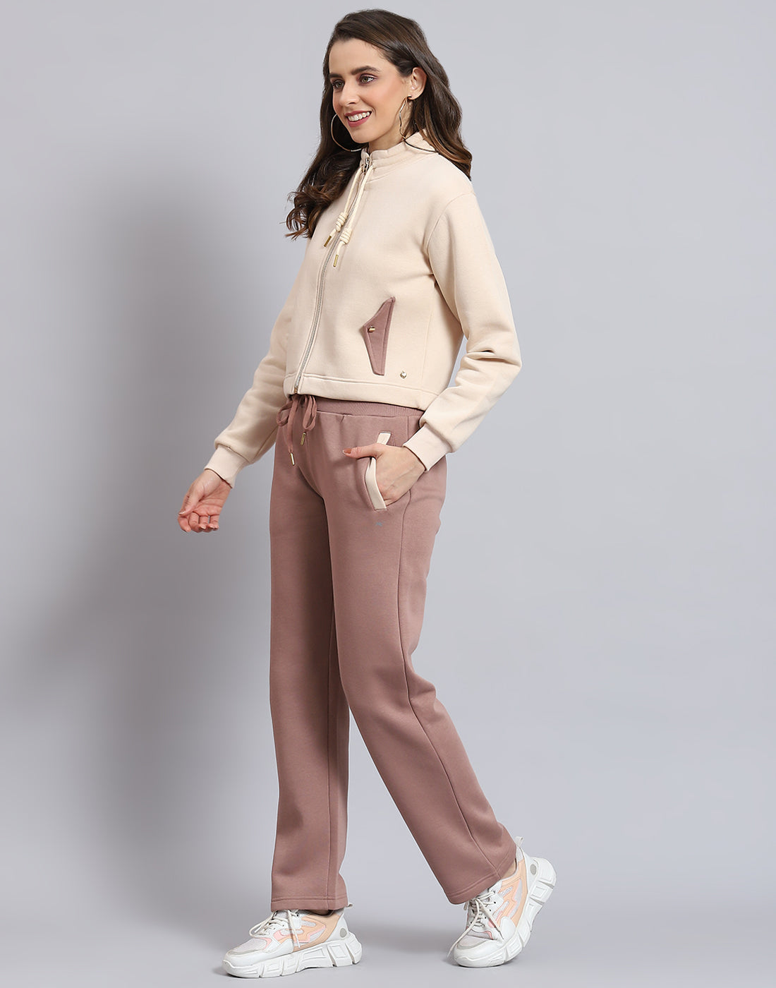 Women Beige Solid Stand Collar Full Sleeve Tracksuit