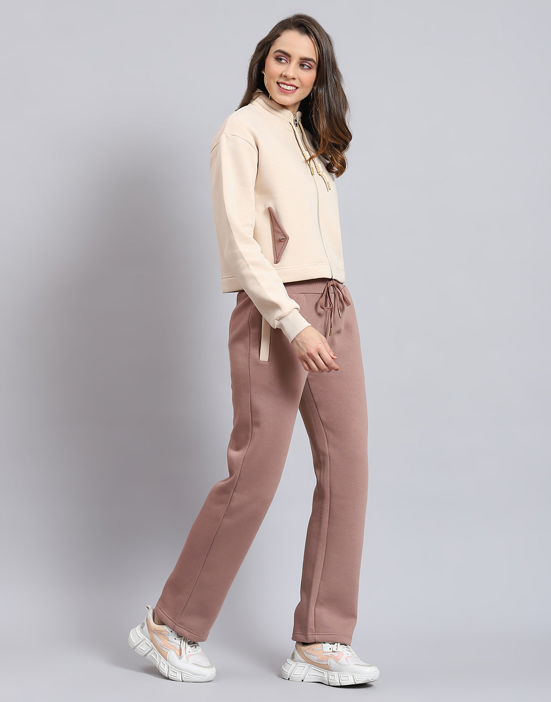 Women Beige Solid Stand Collar Full Sleeve Tracksuit