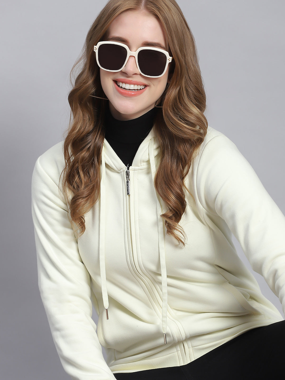 Women Cream Solid Hooded Full Sleeve Sweatshirts